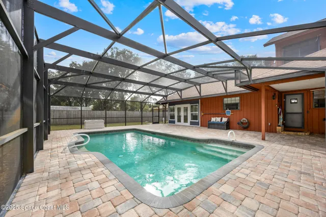 a view of a porch with furniture