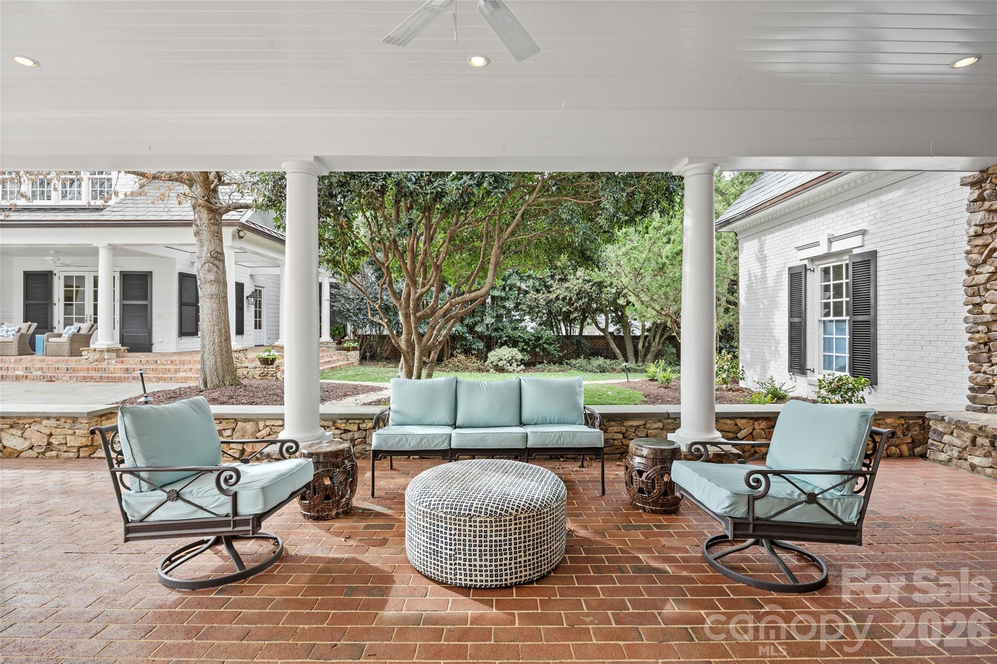 640 Colville Road Charlotte, NC 28207 - Photo 18 of 48 a living room with furniture and a floor to ceiling window