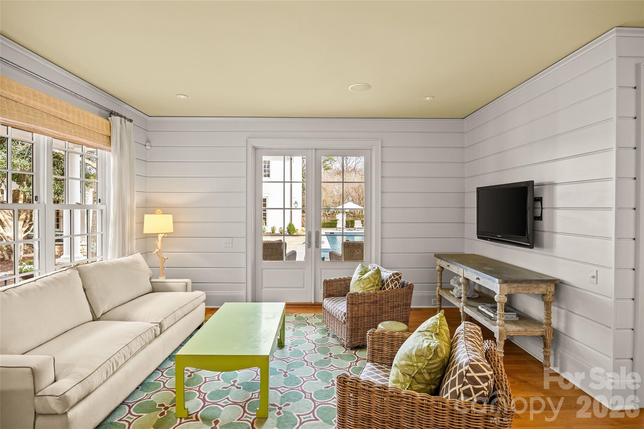 640 Colville Road Charlotte, NC 28207 - Photo 22 of 48 a living room with furniture and a flat screen tv
