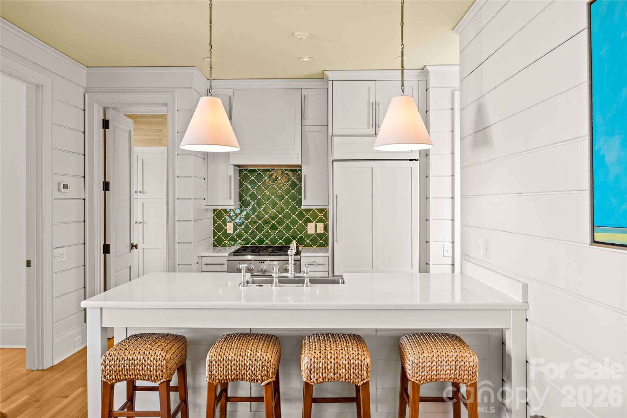 640 Colville Road Charlotte, NC 28207 - Photo 24 of 48 a kitchen with a table and chairs