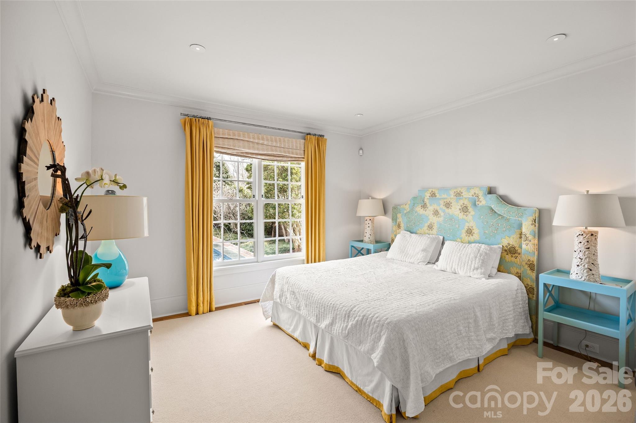 640 Colville Road Charlotte, NC 28207 - Photo 25 of 48 a bedroom with a bed and a window