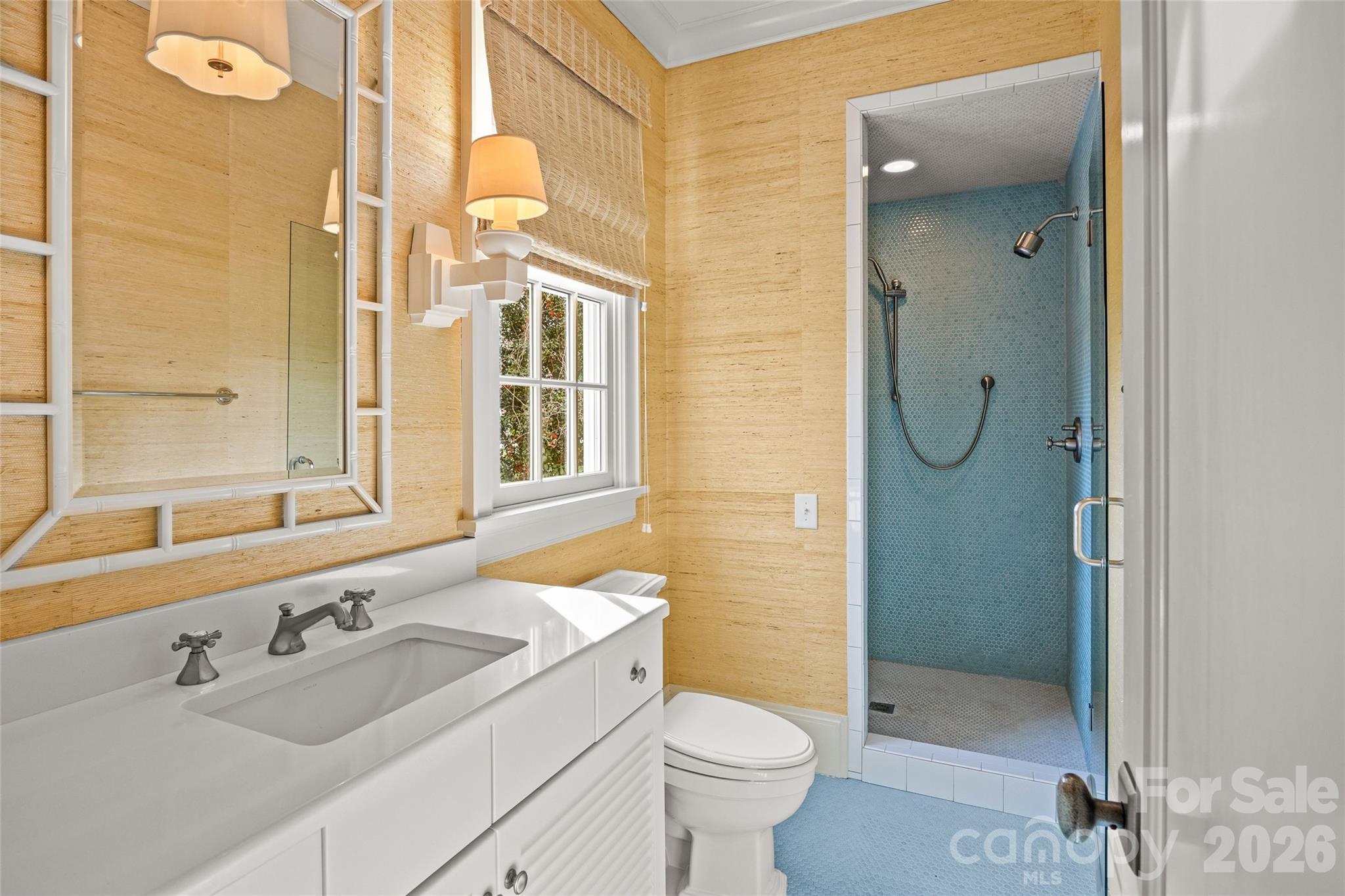 640 Colville Road Charlotte, NC 28207 - Photo 26 of 48 a bathroom with a sink a toilet and shower