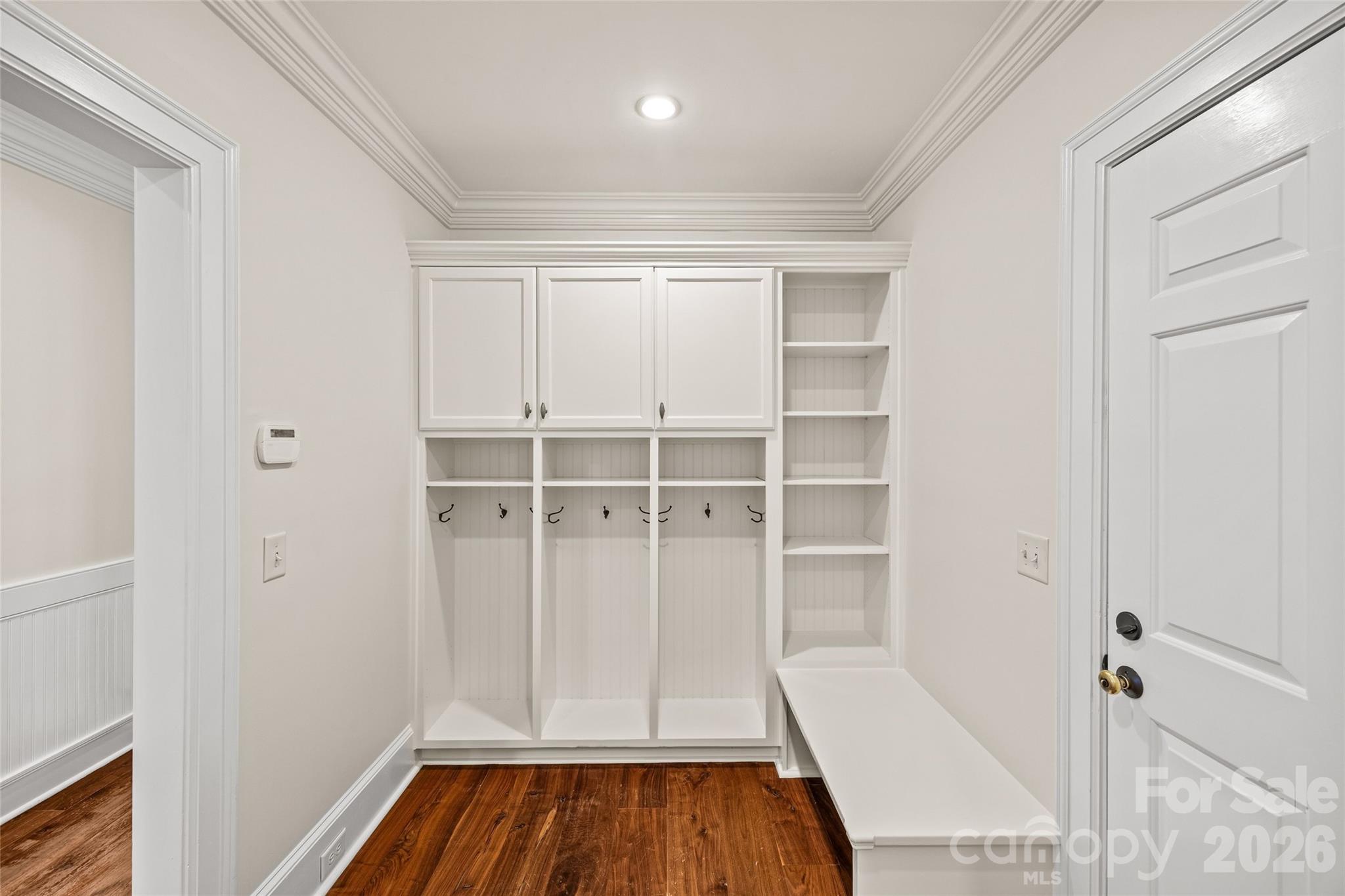 640 Colville Road Charlotte, NC 28207 - Photo 31 of 48 a view of a room with wooden floor and staircase