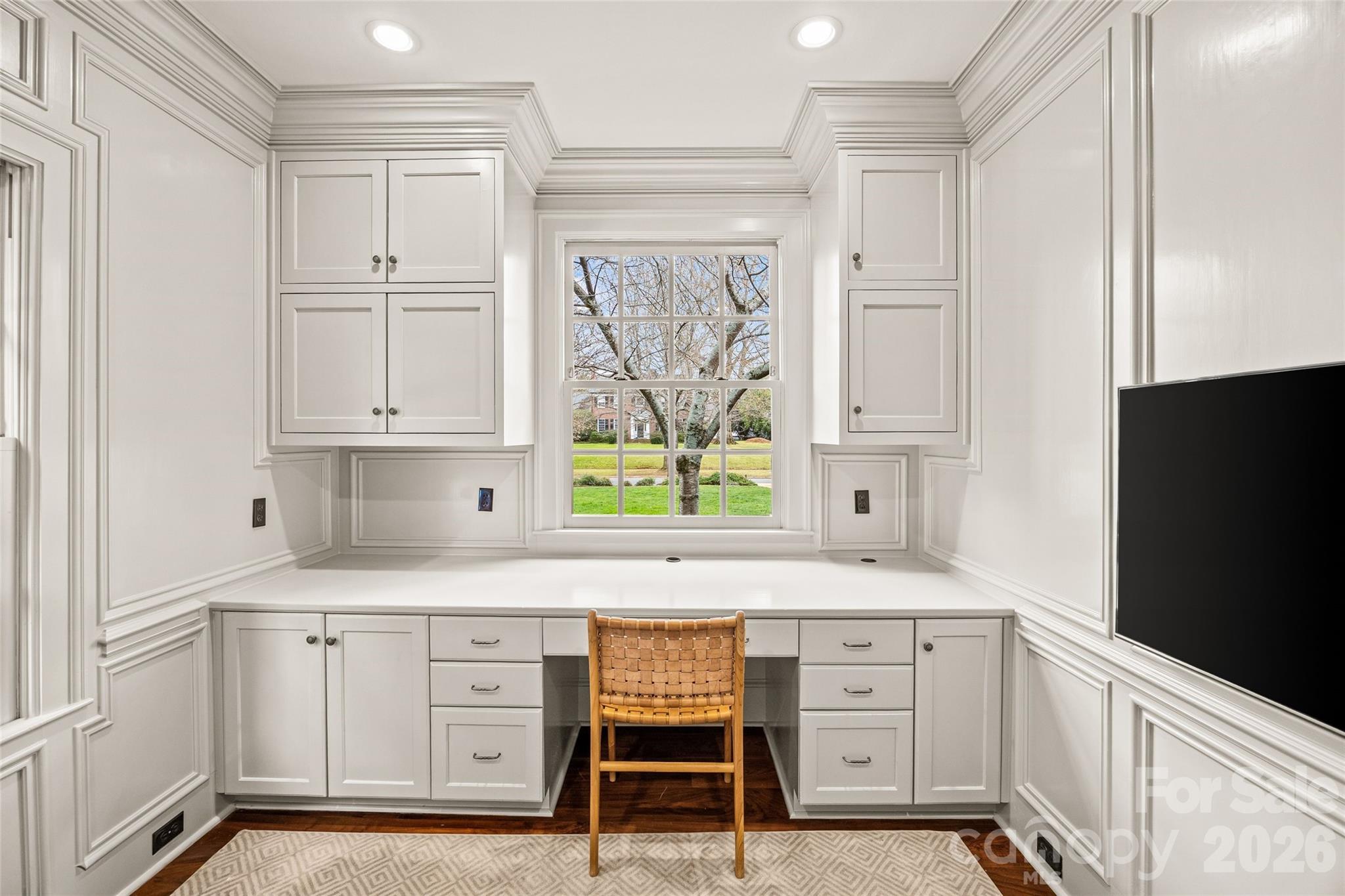 640 Colville Road Charlotte, NC 28207 - Photo 32 of 48 a kitchen with white cabinets and window