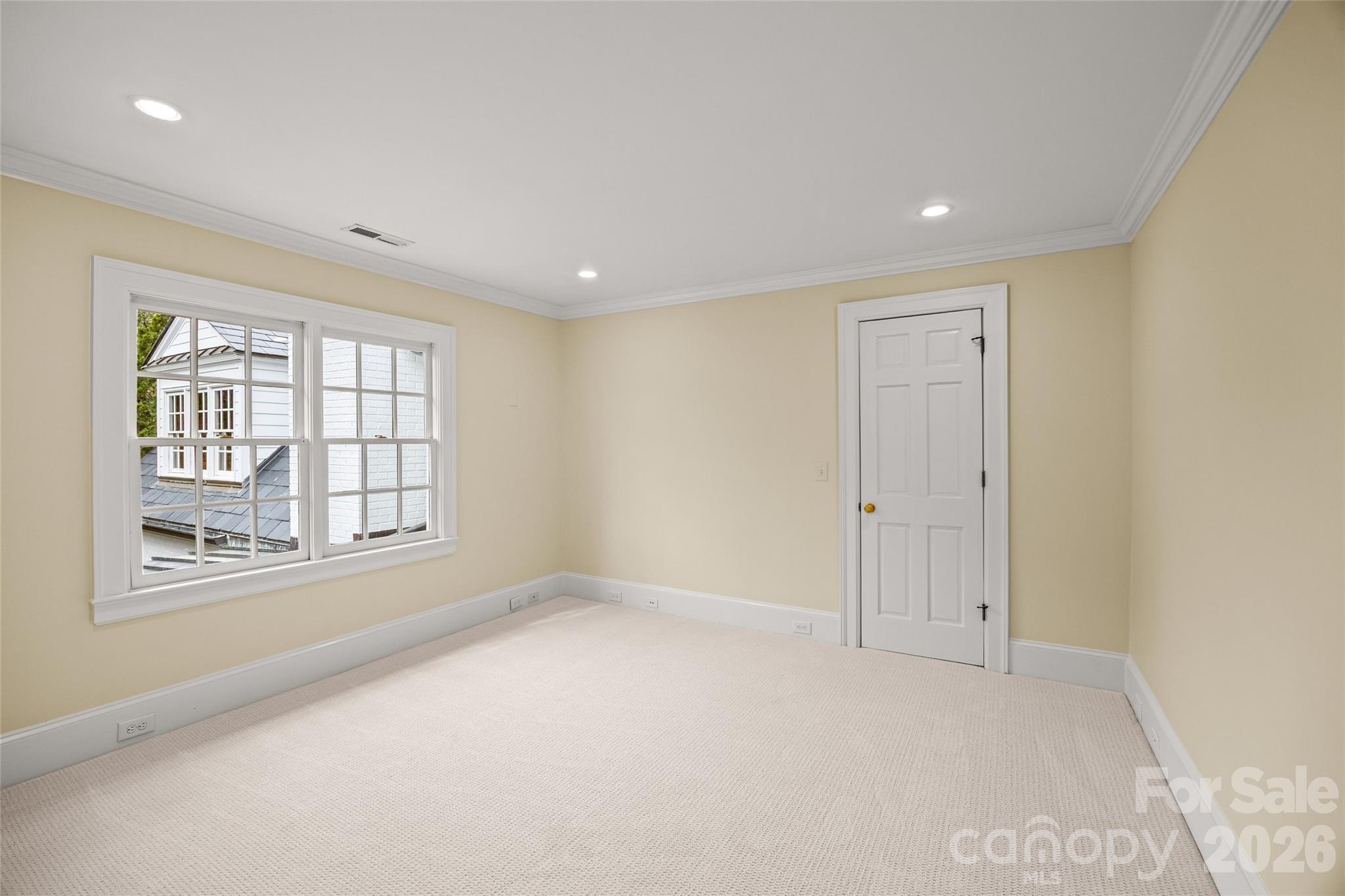 640 Colville Road Charlotte, NC 28207 - Photo 42 of 48 an empty room with a empty space and windows