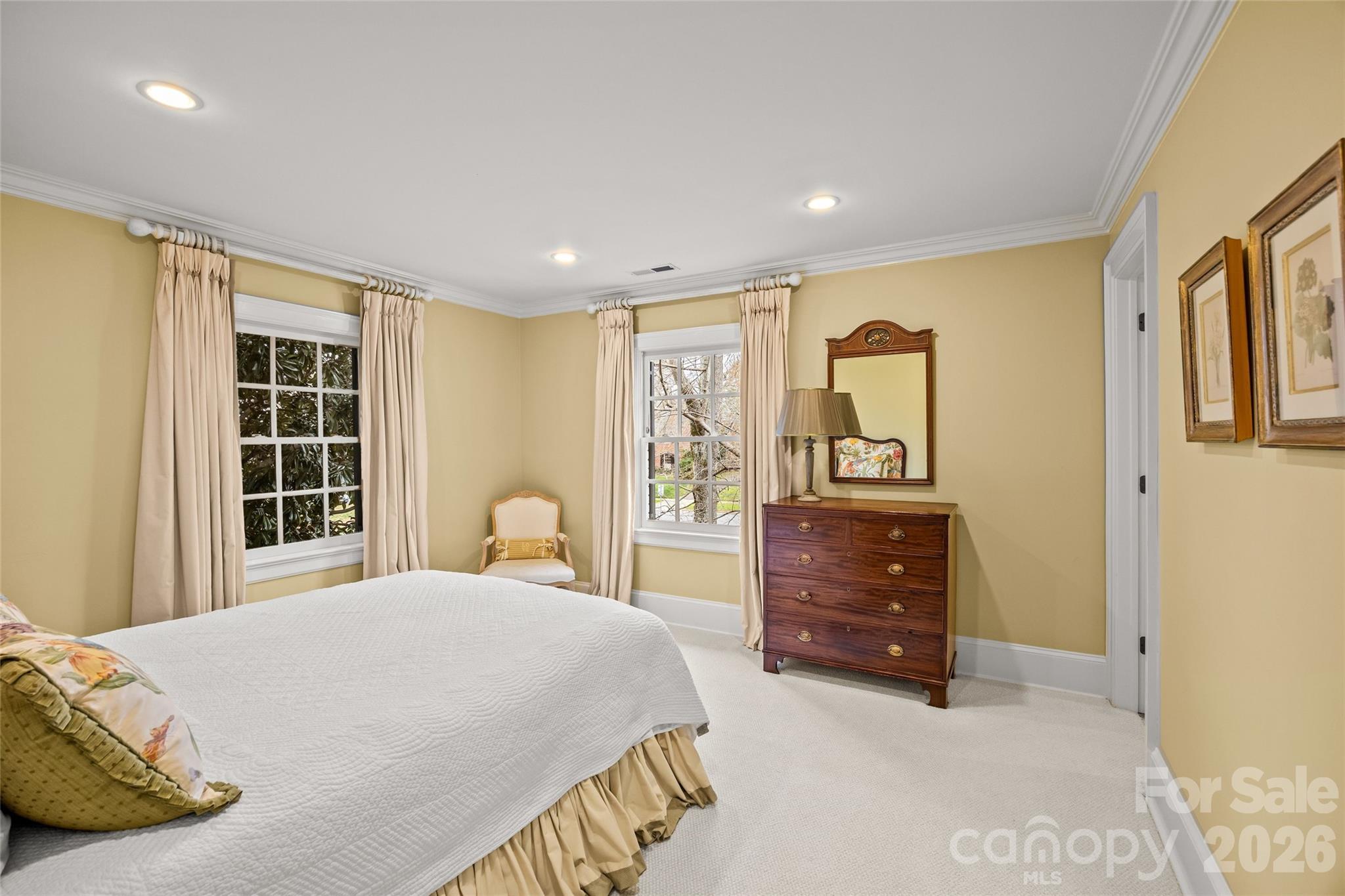 640 Colville Road Charlotte, NC 28207 - Photo 43 of 48 a bedroom with a bed and a dresser