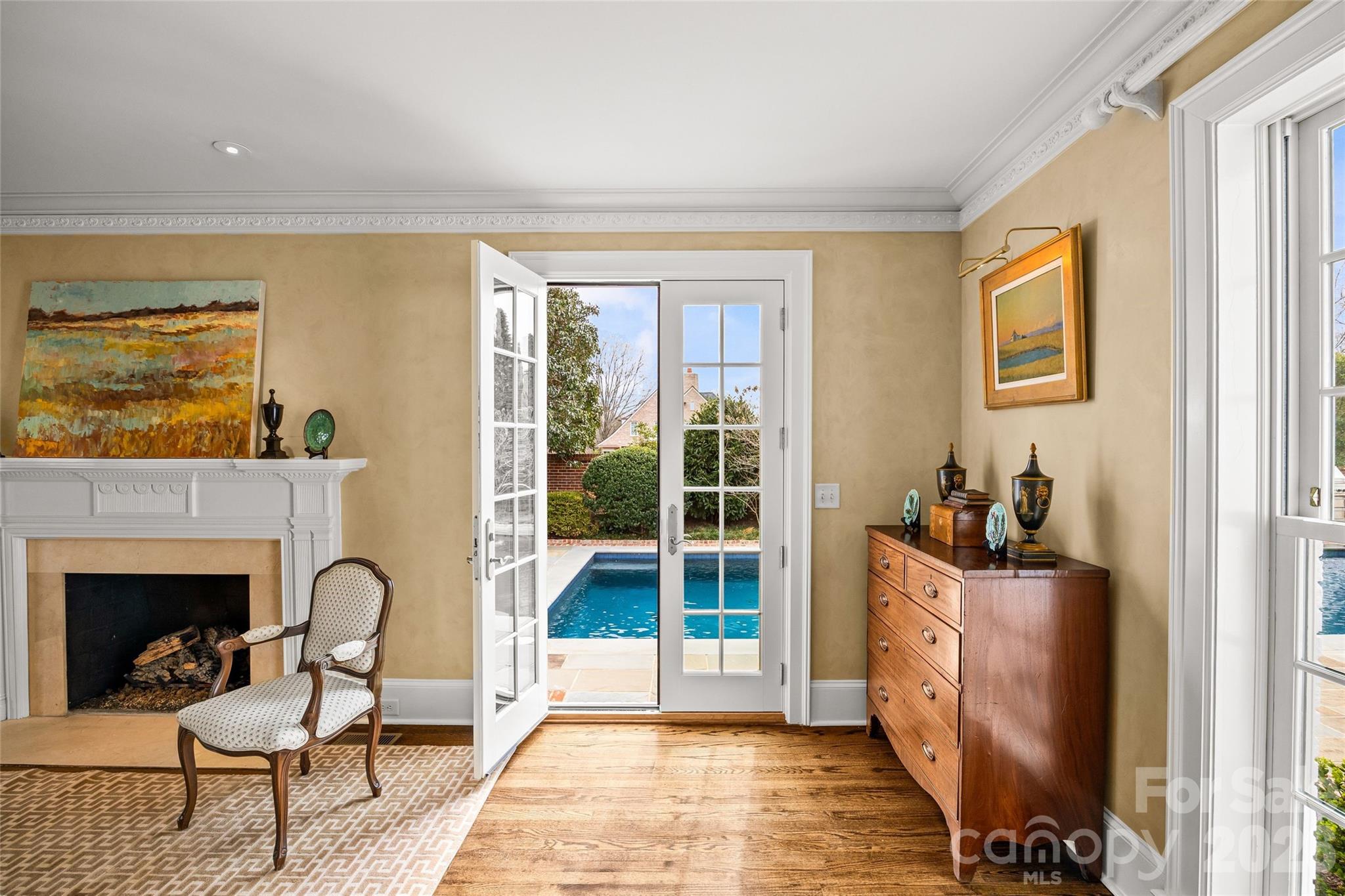 640 Colville Road Charlotte, NC 28207 - Photo 7 of 48 a living room with furniture and a fireplace