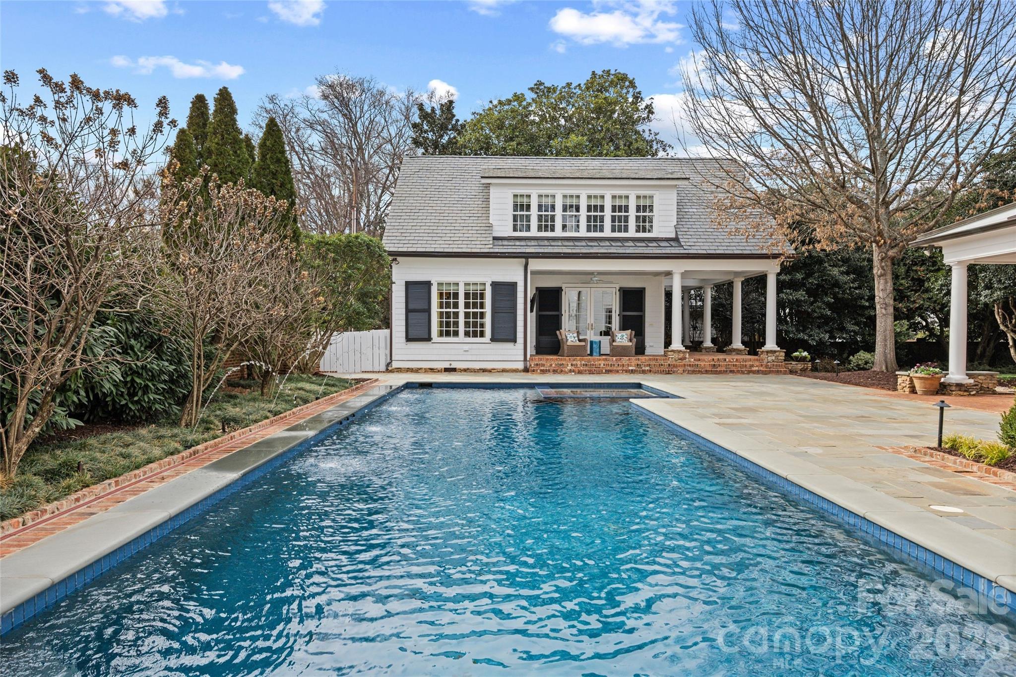 640 Colville Road Charlotte, NC 28207 - Photo 8 of 48 a view of a house with swimming pool