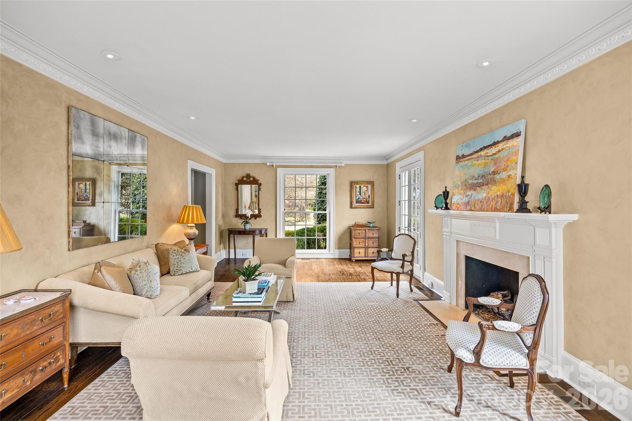 640 Colville Road Charlotte, NC 28207 - Photo 9 of 48 a living room with furniture and a fireplace