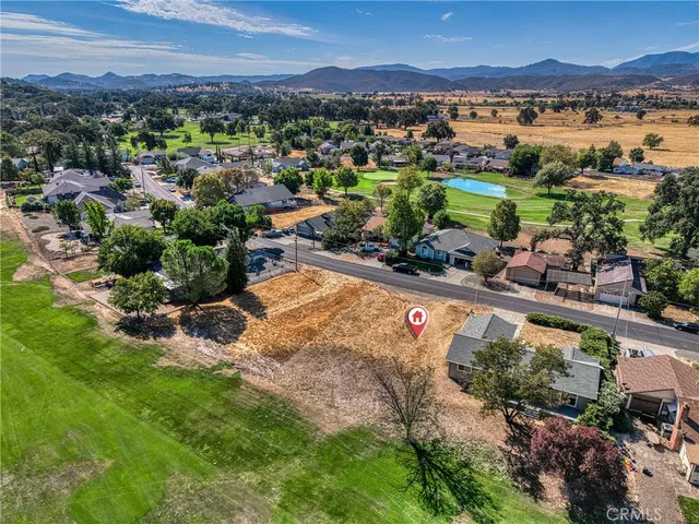 a view of a city with mountains in the background