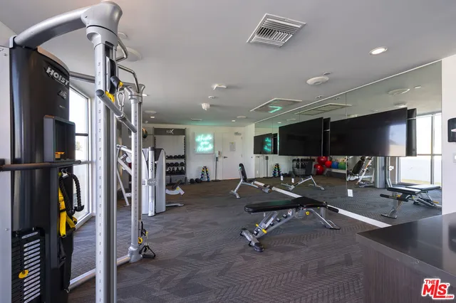 a view of a room with gym equipment