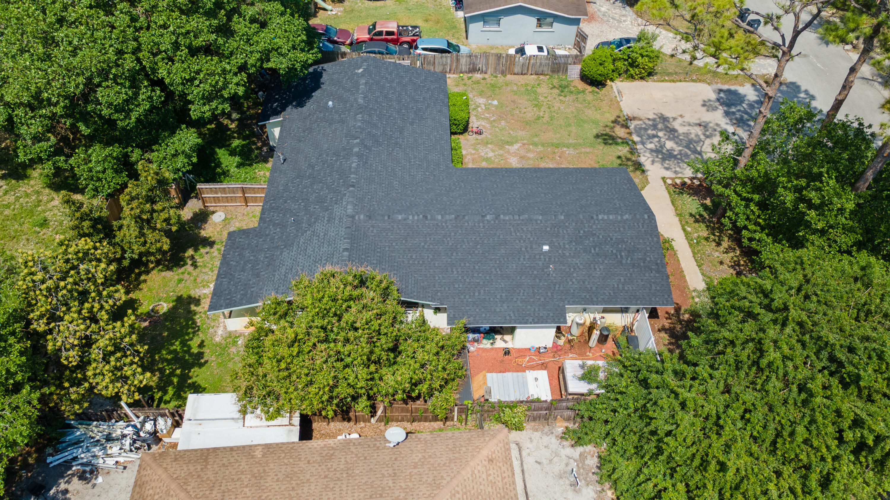 4453 Stevens Road Lake Worth Beach, FL 33461 - Photo 19 of 67 an aerial view of a house with a yard and a large tree