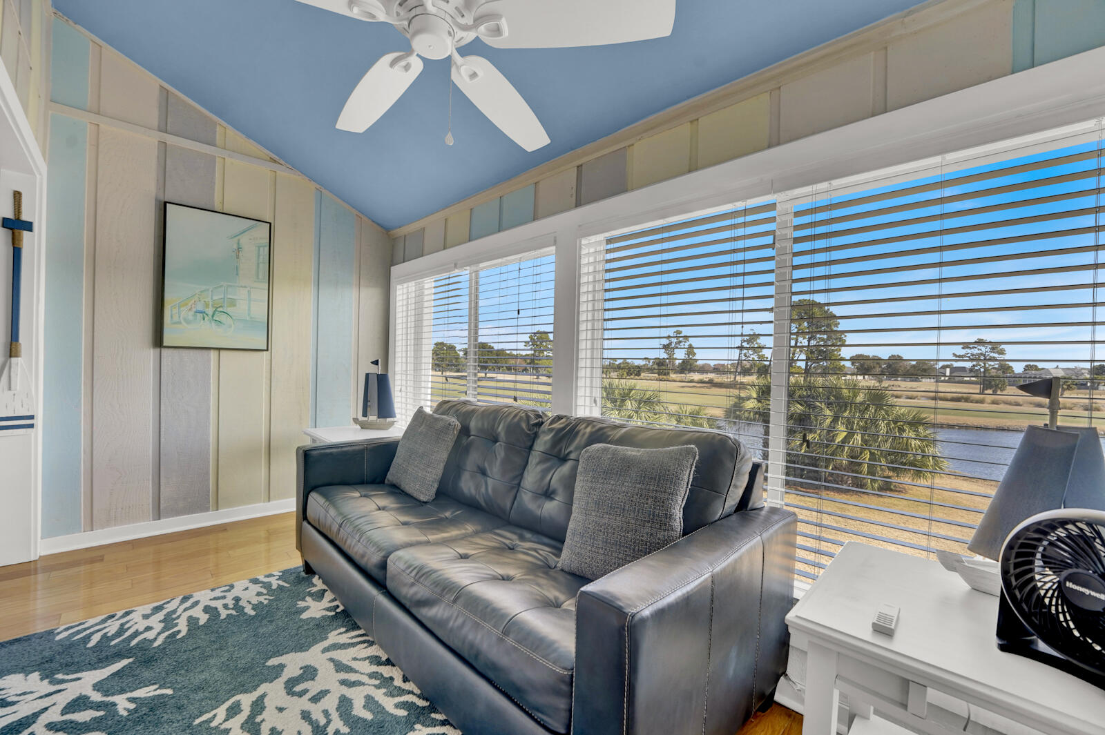 4725 Bay Point Road, Unit 261 Panama City Beach, FL 32408 - Photo 11 of 38 a living room with furniture and a couch