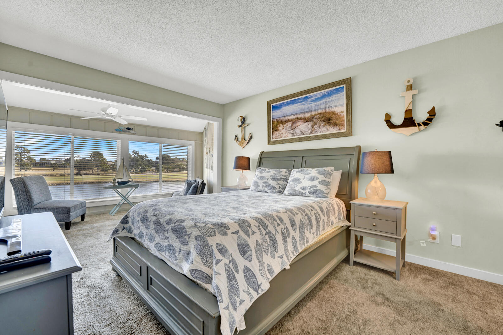 4725 Bay Point Road, Unit 261 Panama City Beach, FL 32408 - Photo 14 of 38 a bedroom with a bed and window