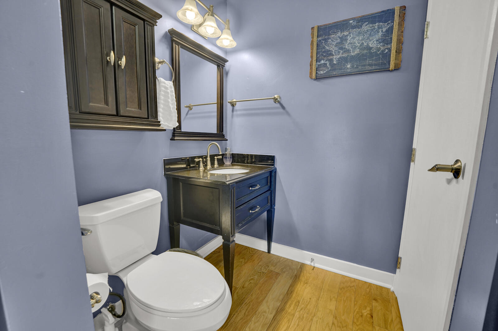 4725 Bay Point Road, Unit 261 Panama City Beach, FL 32408 - Photo 21 of 38 a bathroom with a toilet a sink and mirror