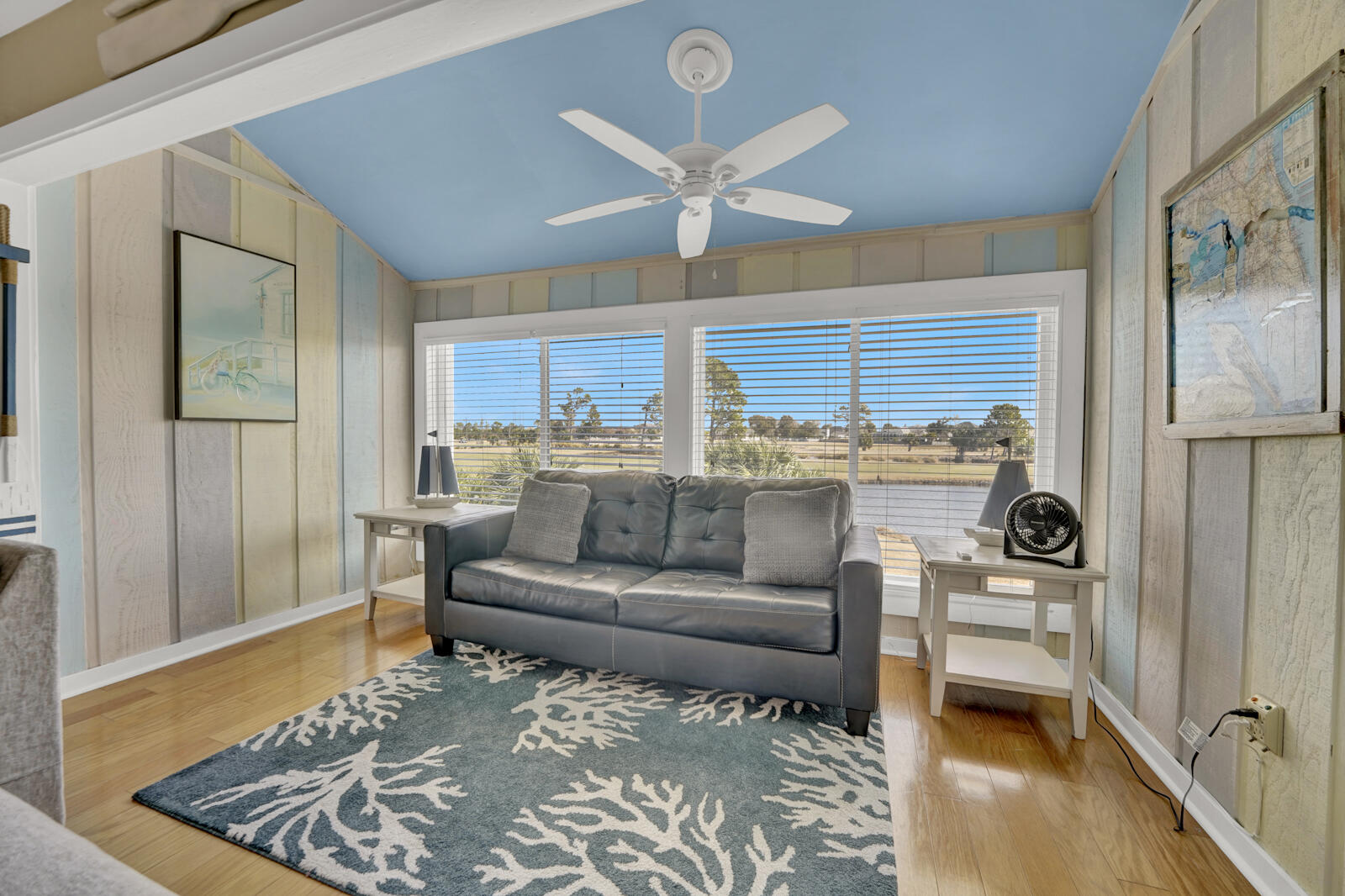 4725 Bay Point Road, Unit 261 Panama City Beach, FL 32408 - Photo 9 of 38 a living room with furniture and a large window