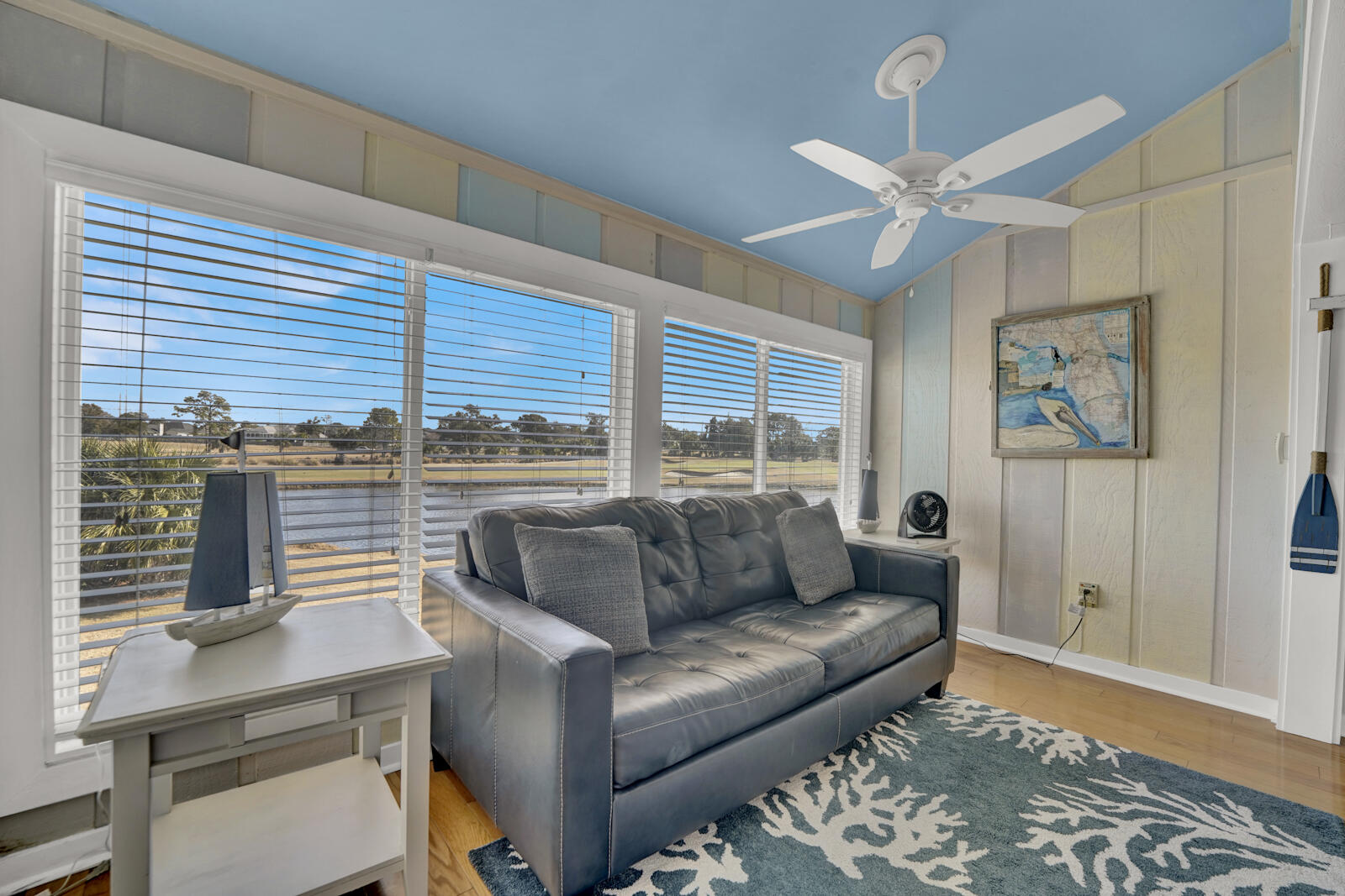 4725 Bay Point Road, Unit 261 Panama City Beach, FL 32408 - Photo 10 of 38 a living room with furniture and a large window