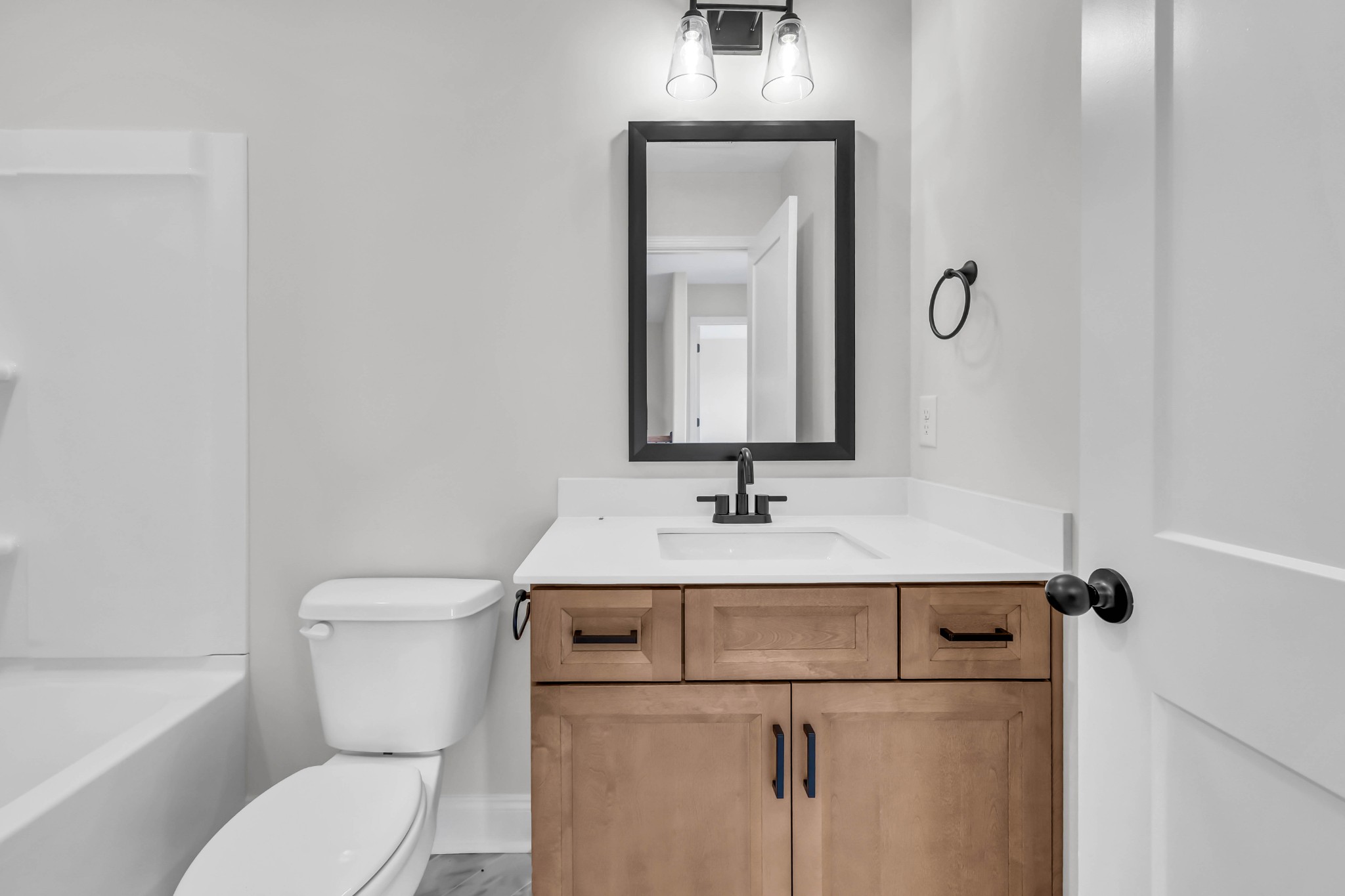 195 Quarry View Clarksville, TN 37043 - Photo 26 of 33 a bathroom with a toilet sink and mirror
