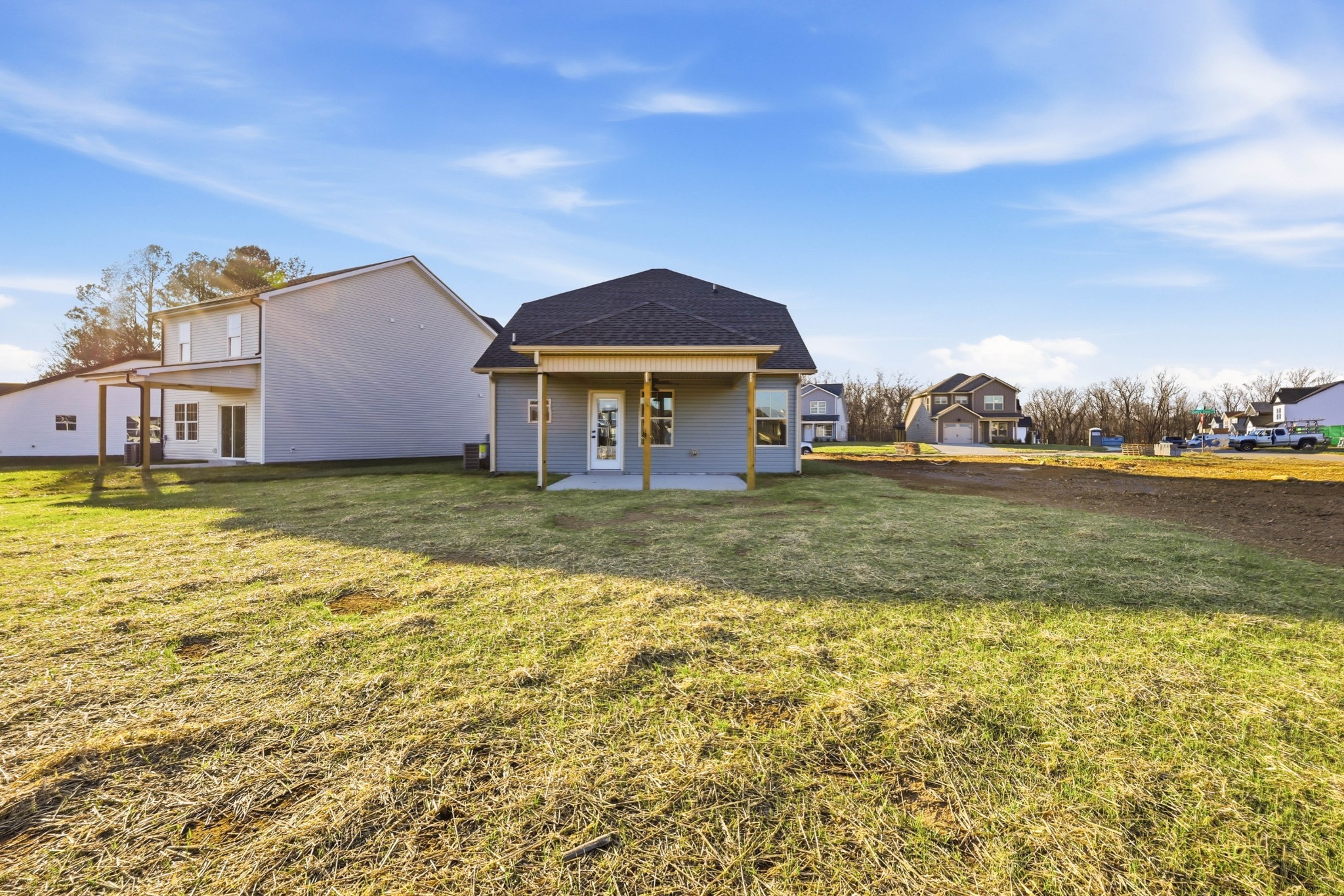 195 Quarry View Clarksville, TN 37043 - Photo 31 of 33 a front view of a house with a garden and lake view