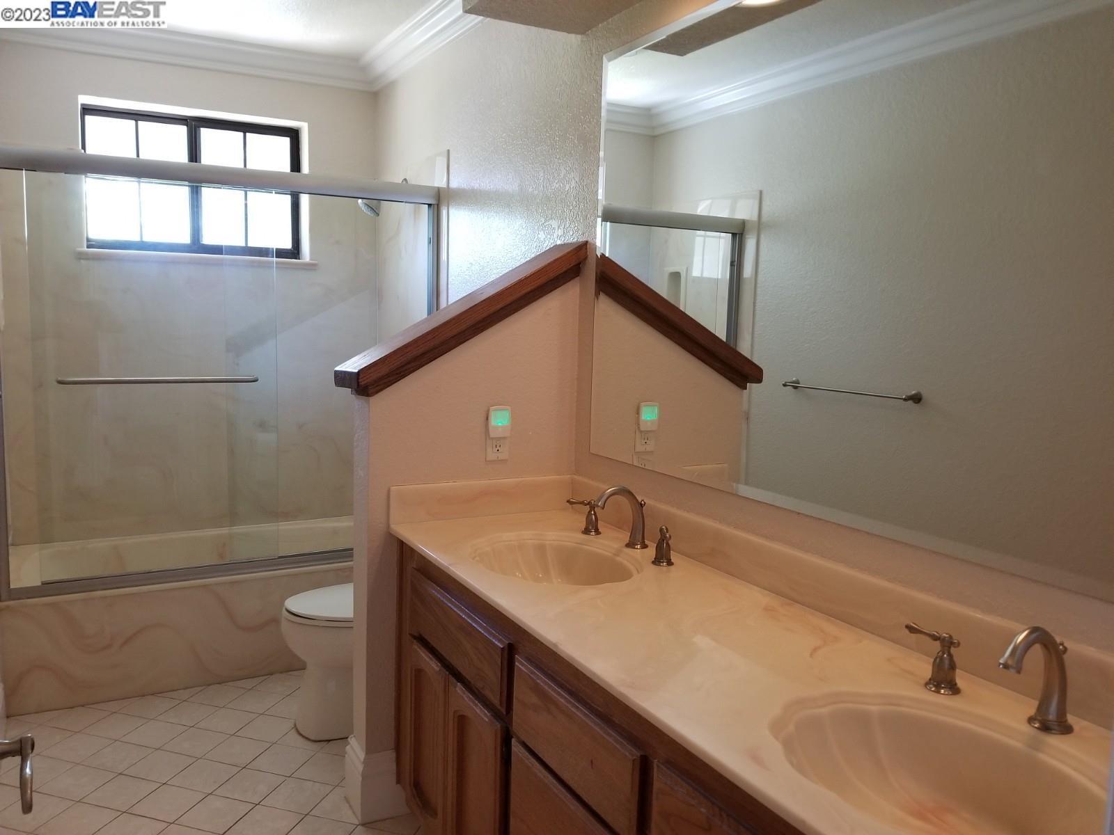 502 Regulus Road Livermore, CA 94550 - Photo 18 of 27 a bathroom with a sink a toilet and shower
