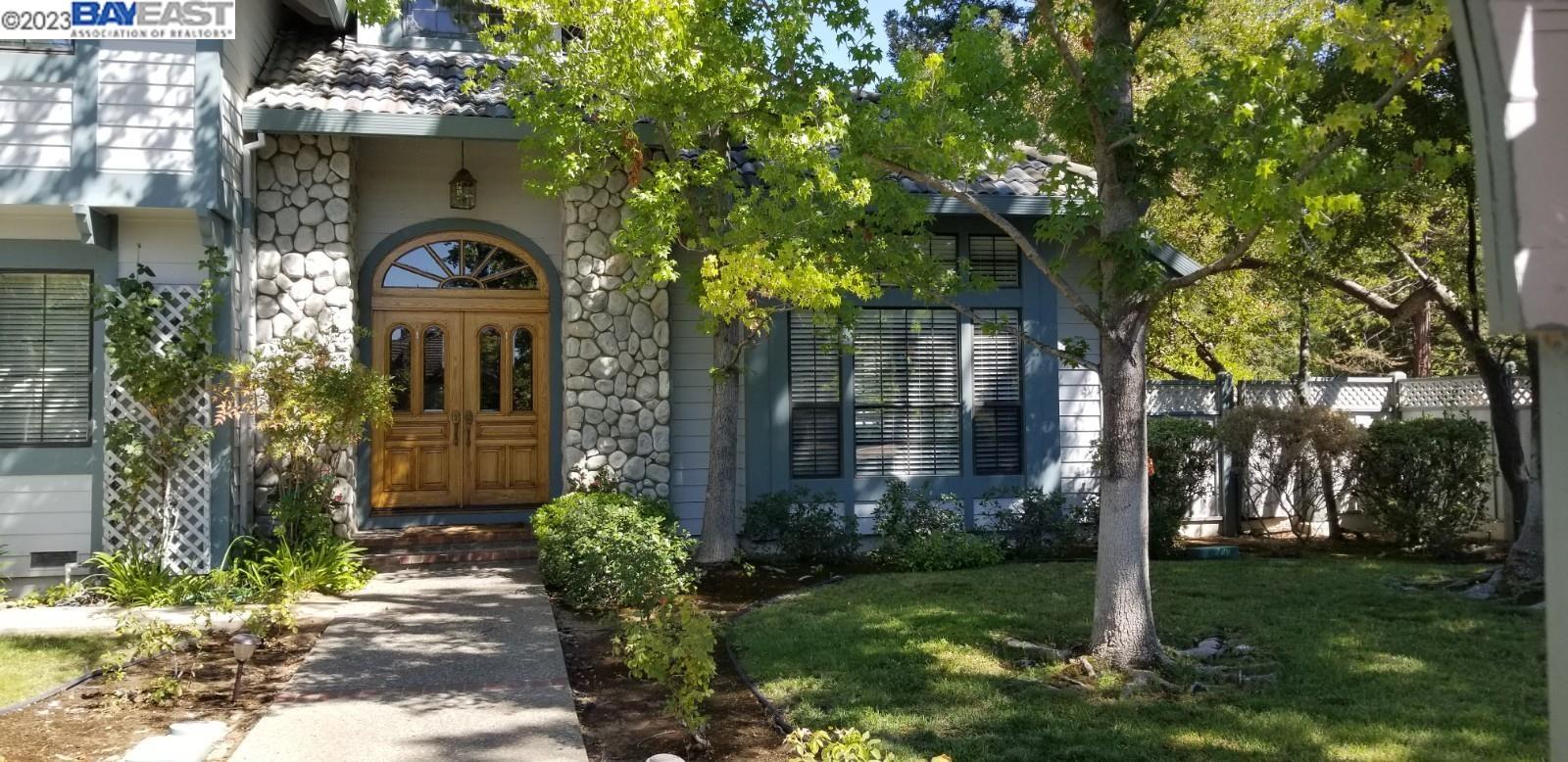 502 Regulus Road Livermore, CA 94550 - Photo 2 of 27 a front view of a house with garden