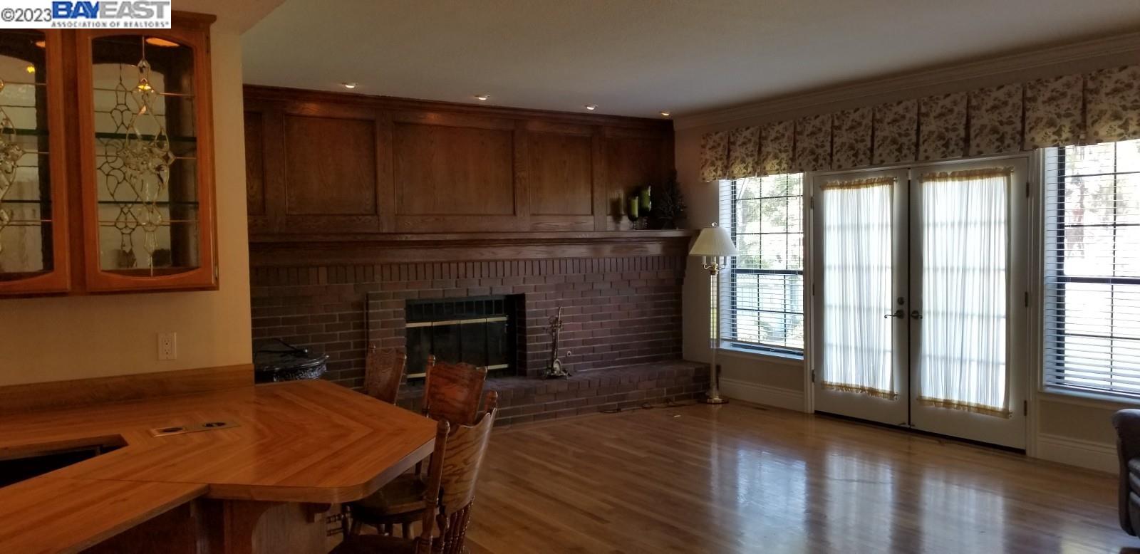 502 Regulus Road Livermore, CA 94550 - Photo 8 of 27 a living room with furniture and a fireplace