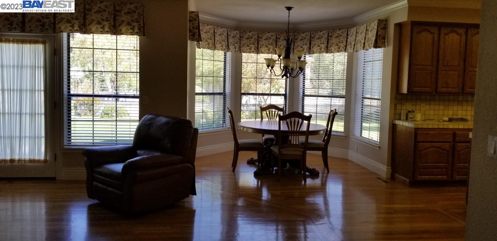 502 Regulus Road Livermore, CA 94550 - Photo 9 of 27 a living room with furniture and a large window