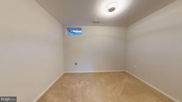 an empty room with an entryway