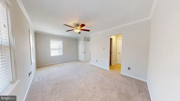 a view of an empty walk in closet