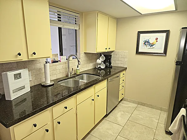 a living room with furniture and rug