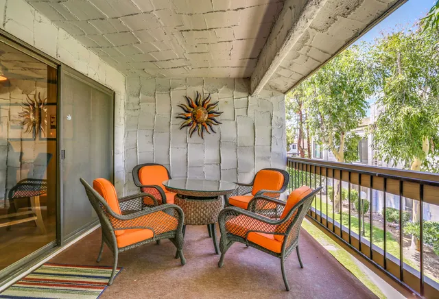 a view of room with window and furniture