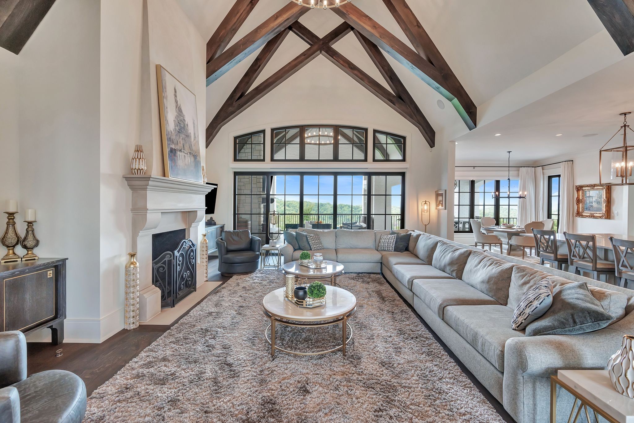 467 Canterbury Rise Franklin, TN 37067 - Photo 19 of 100 a living room with furniture a fireplace and a chandelier