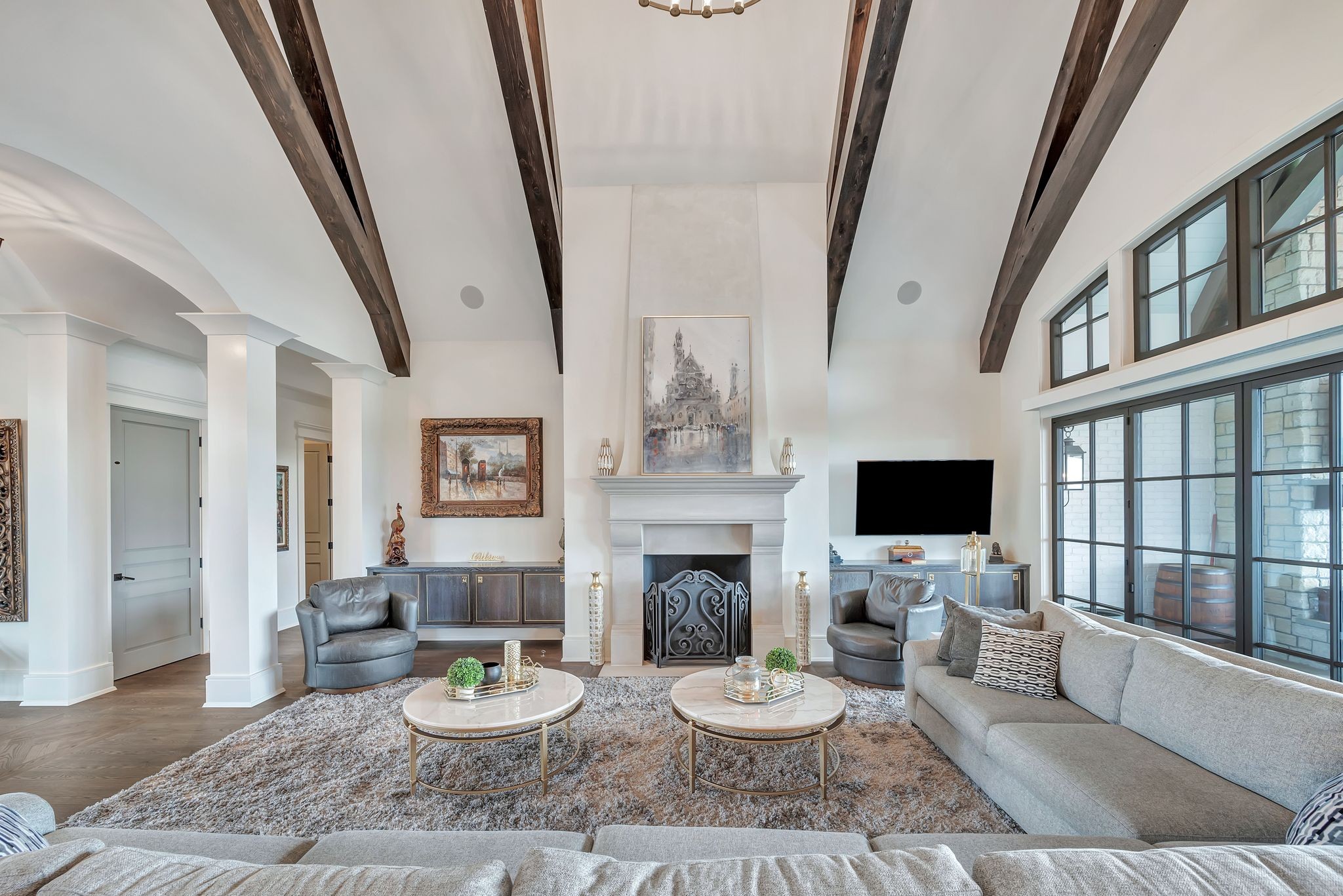 467 Canterbury Rise Franklin, TN 37067 - Photo 21 of 100 a living room with furniture a fireplace and a flat screen tv