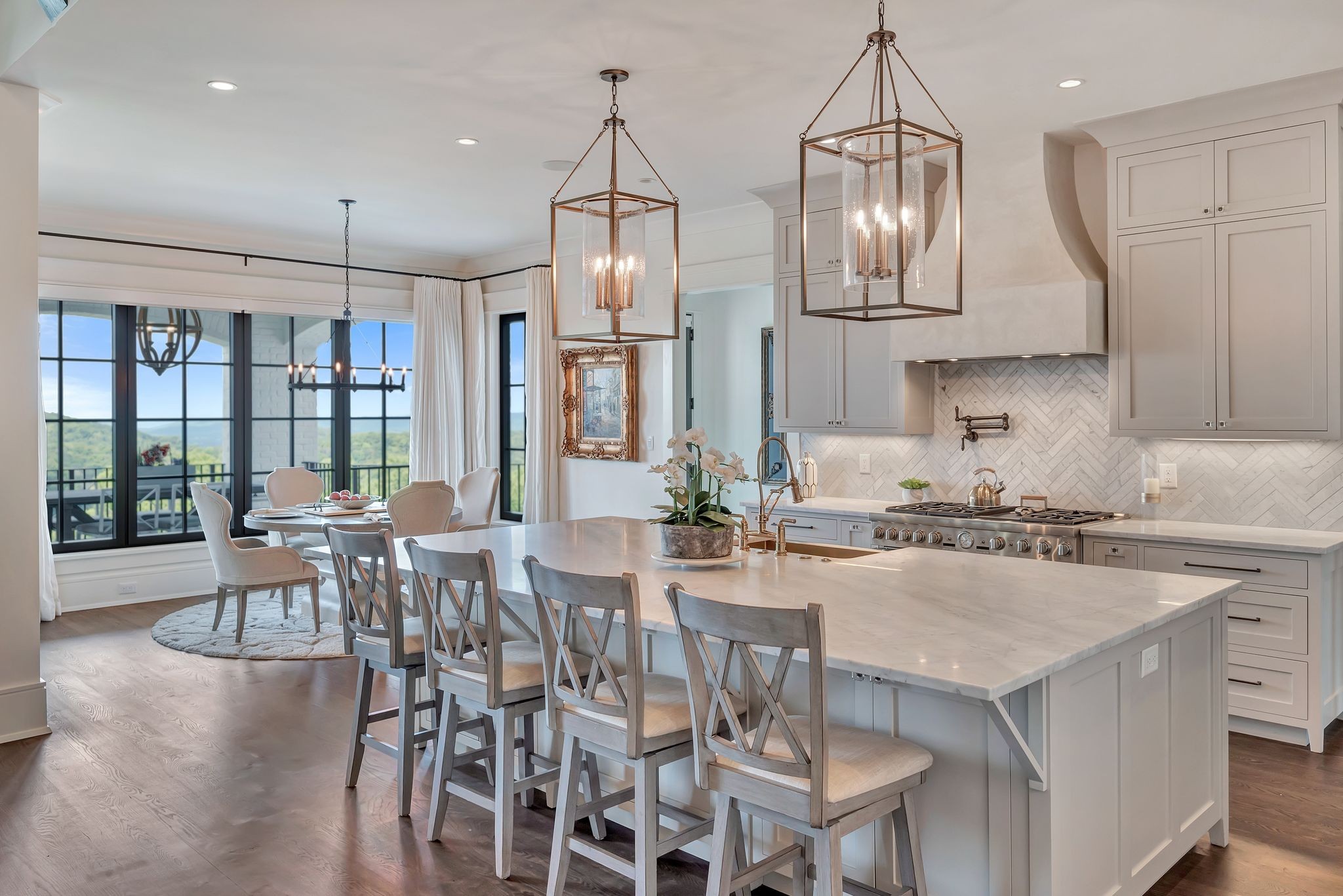 467 Canterbury Rise Franklin, TN 37067 - Photo 26 of 100 a kitchen with stainless steel appliances granite countertop a stove a refrigerator a kitchen island a table and chairs