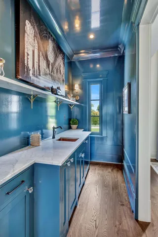 a bedroom with a large bed and a flat screen tv