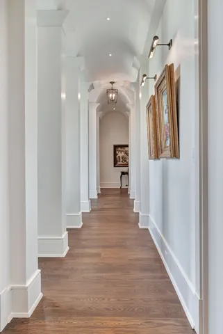 a bathroom with a double vanity and a mirror