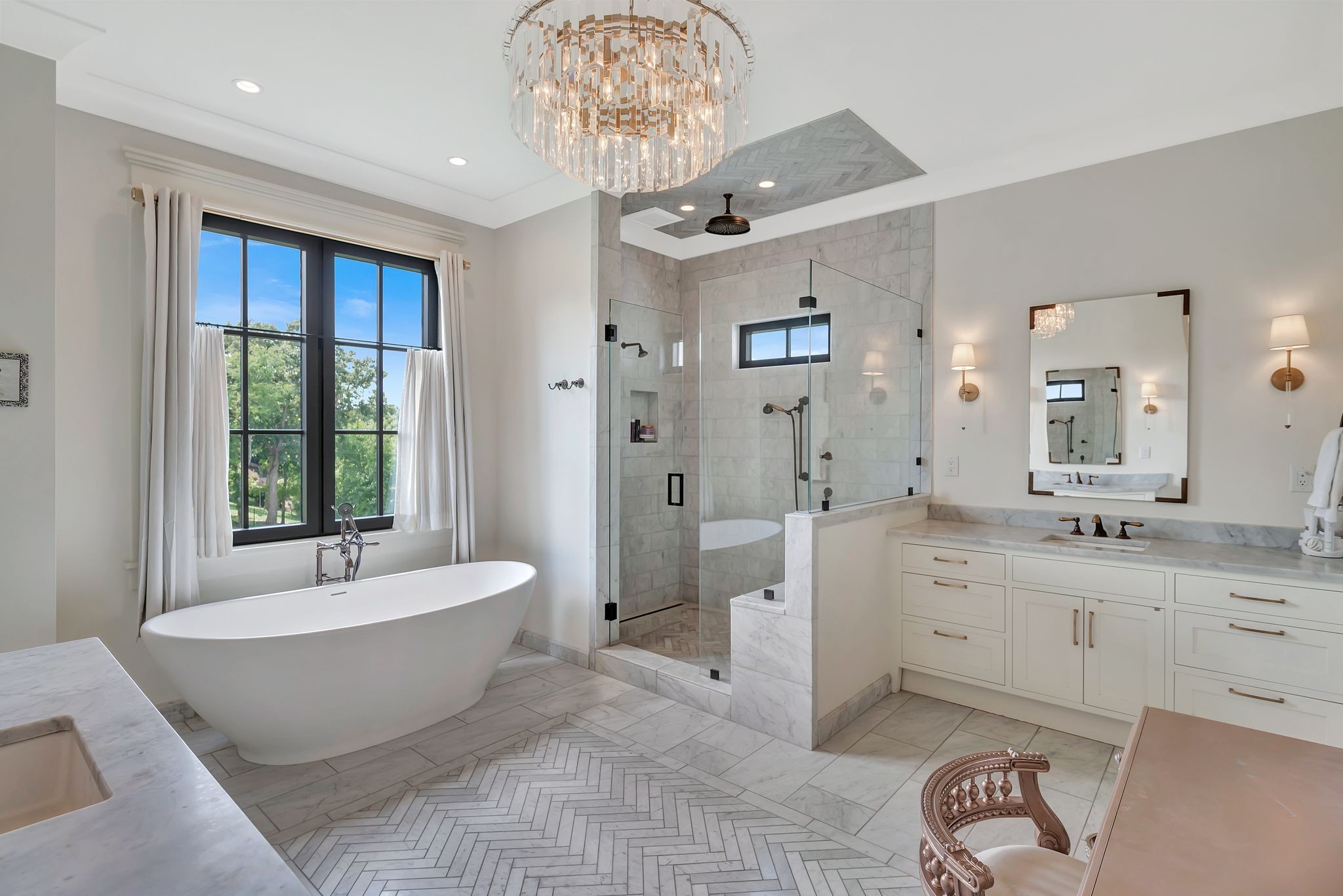 467 Canterbury Rise Franklin, TN 37067 - Photo 39 of 100 a spacious bathroom with a double vanity sink a mirror and a bathtub