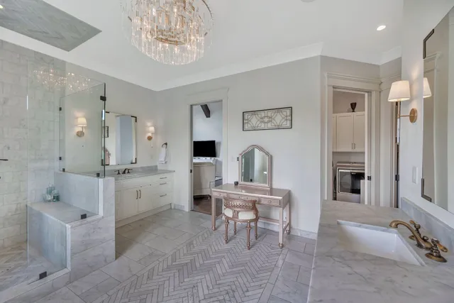 a view of a livingroom with workspace and a window