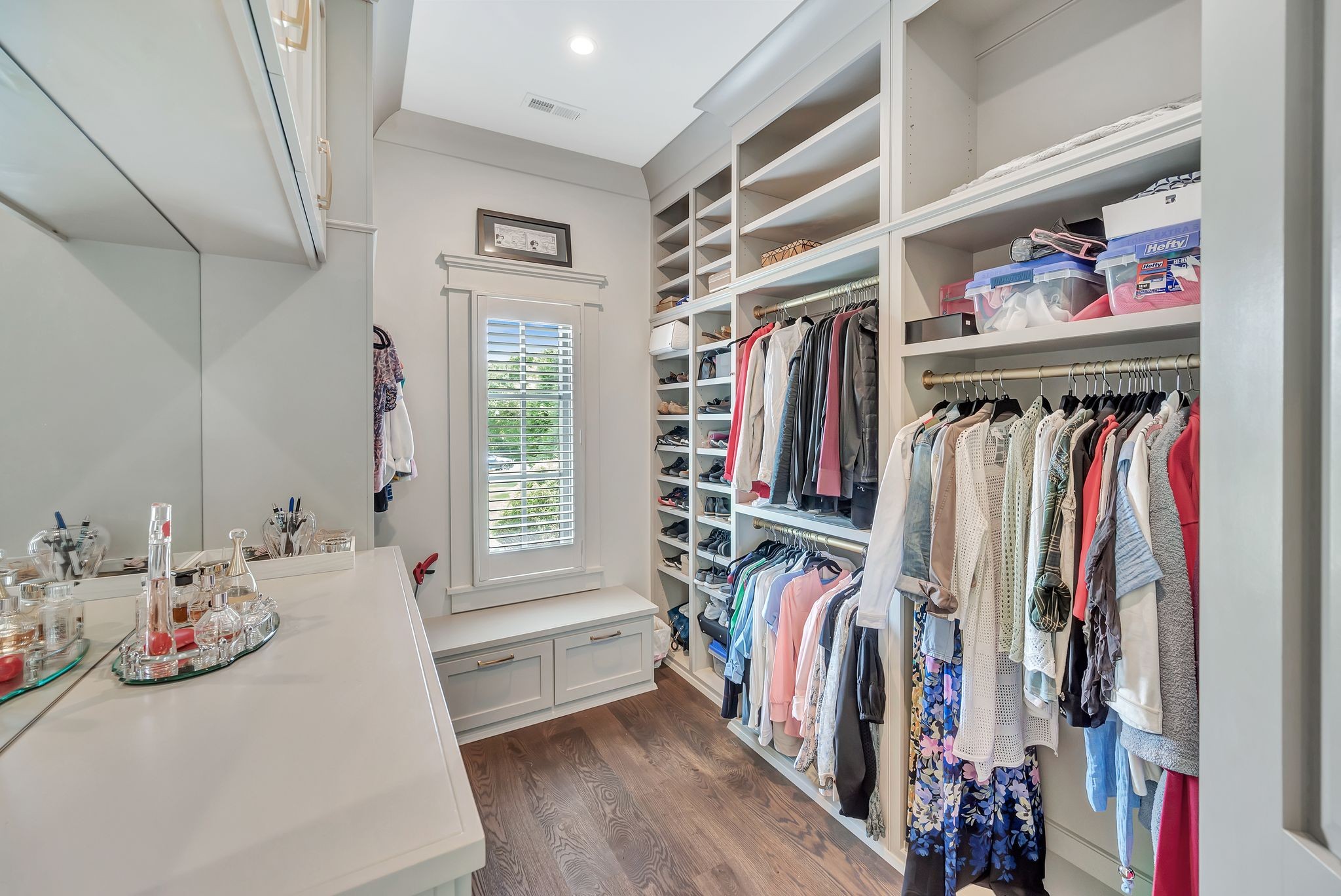 467 Canterbury Rise Franklin, TN 37067 - Photo 44 of 100 a view of walk in closet with clothes and shoes