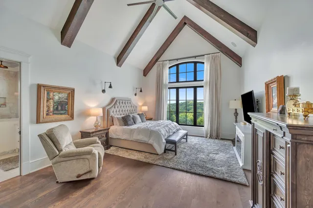 a view of a house with swimming pool and a yard