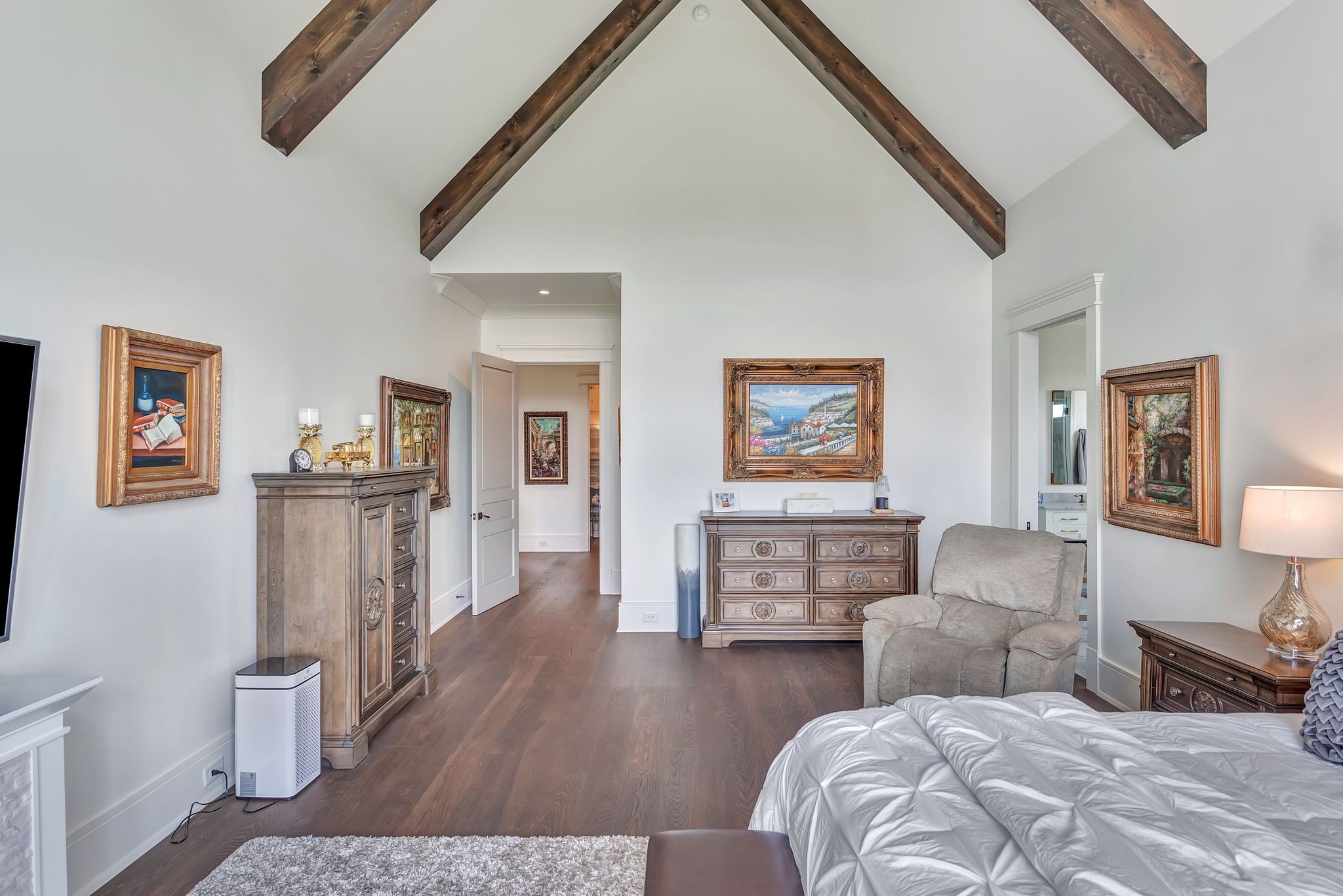 467 Canterbury Rise Franklin, TN 37067 - Photo 48 of 100 a bedroom with furniture and a wooden floor