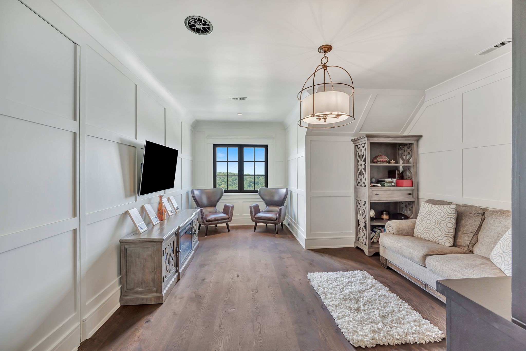 467 Canterbury Rise Franklin, TN 37067 - Photo 53 of 100 a living room with furniture or couch and a chandelier