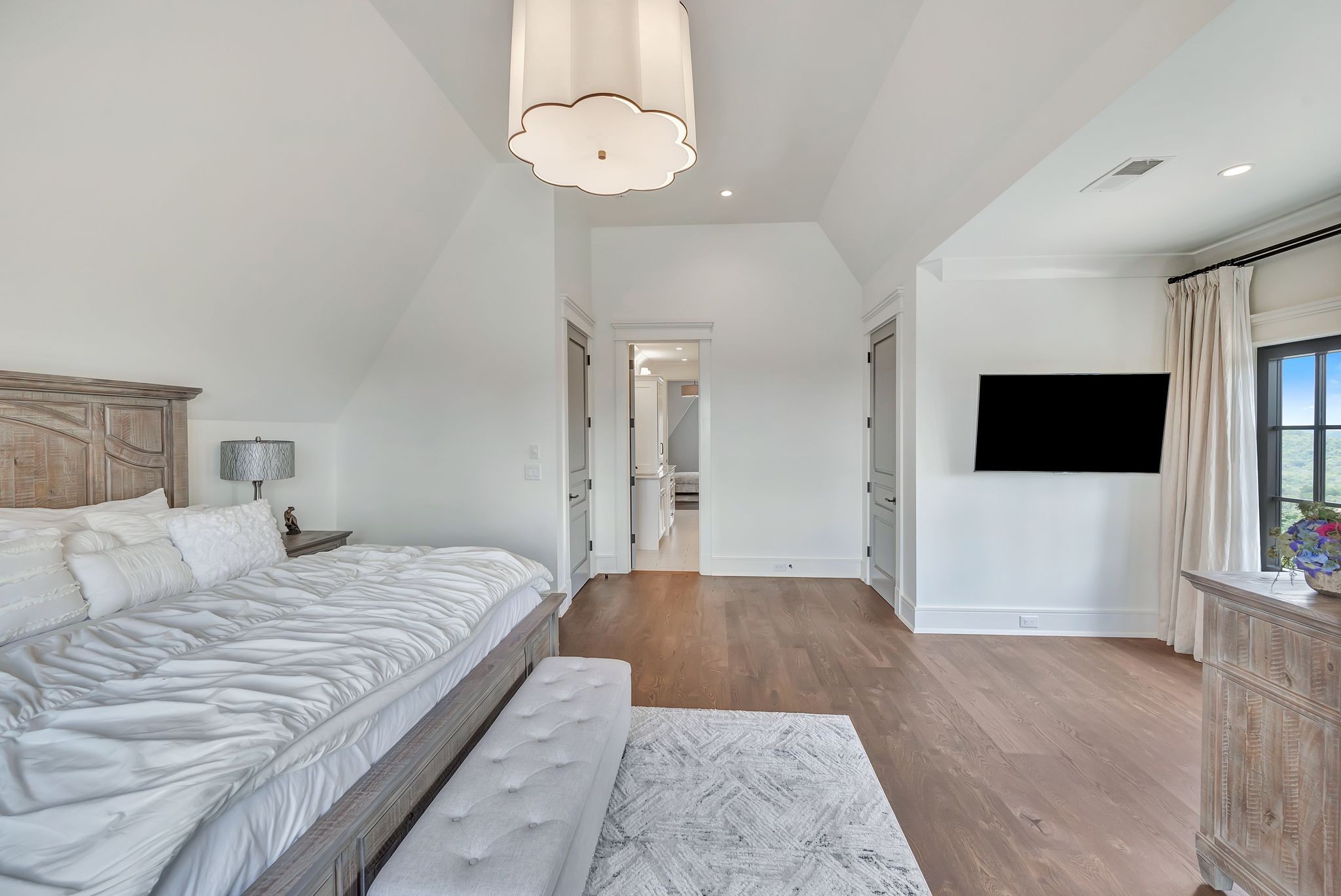 467 Canterbury Rise Franklin, TN 37067 - Photo 61 of 100 a bedroom with a large bed and a flat screen tv
