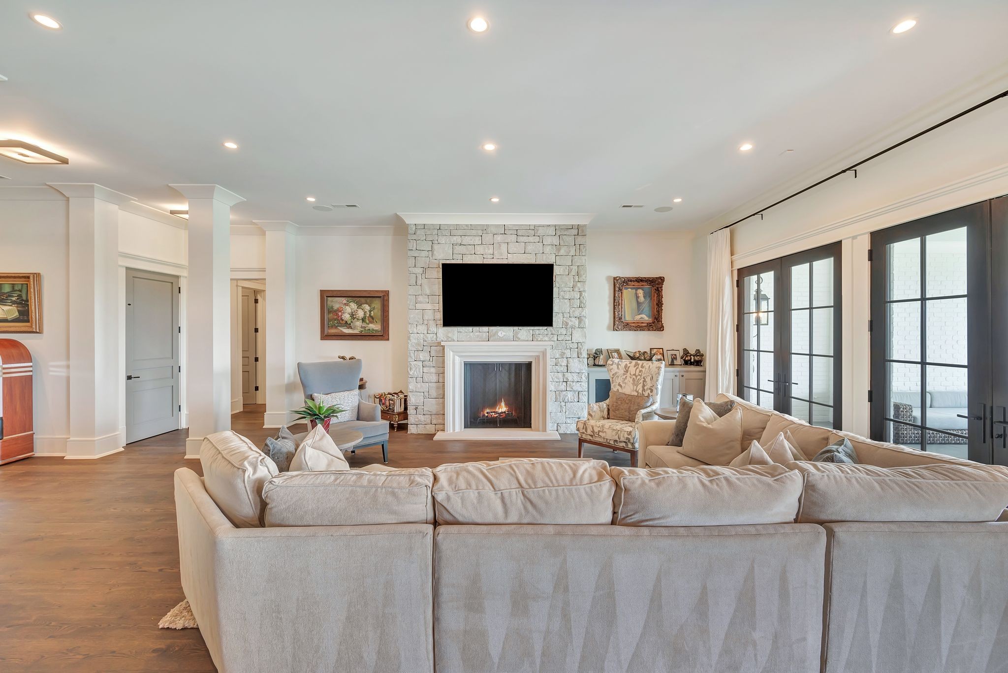 467 Canterbury Rise Franklin, TN 37067 - Photo 69 of 100 a living room with fireplace furniture and a flat screen tv