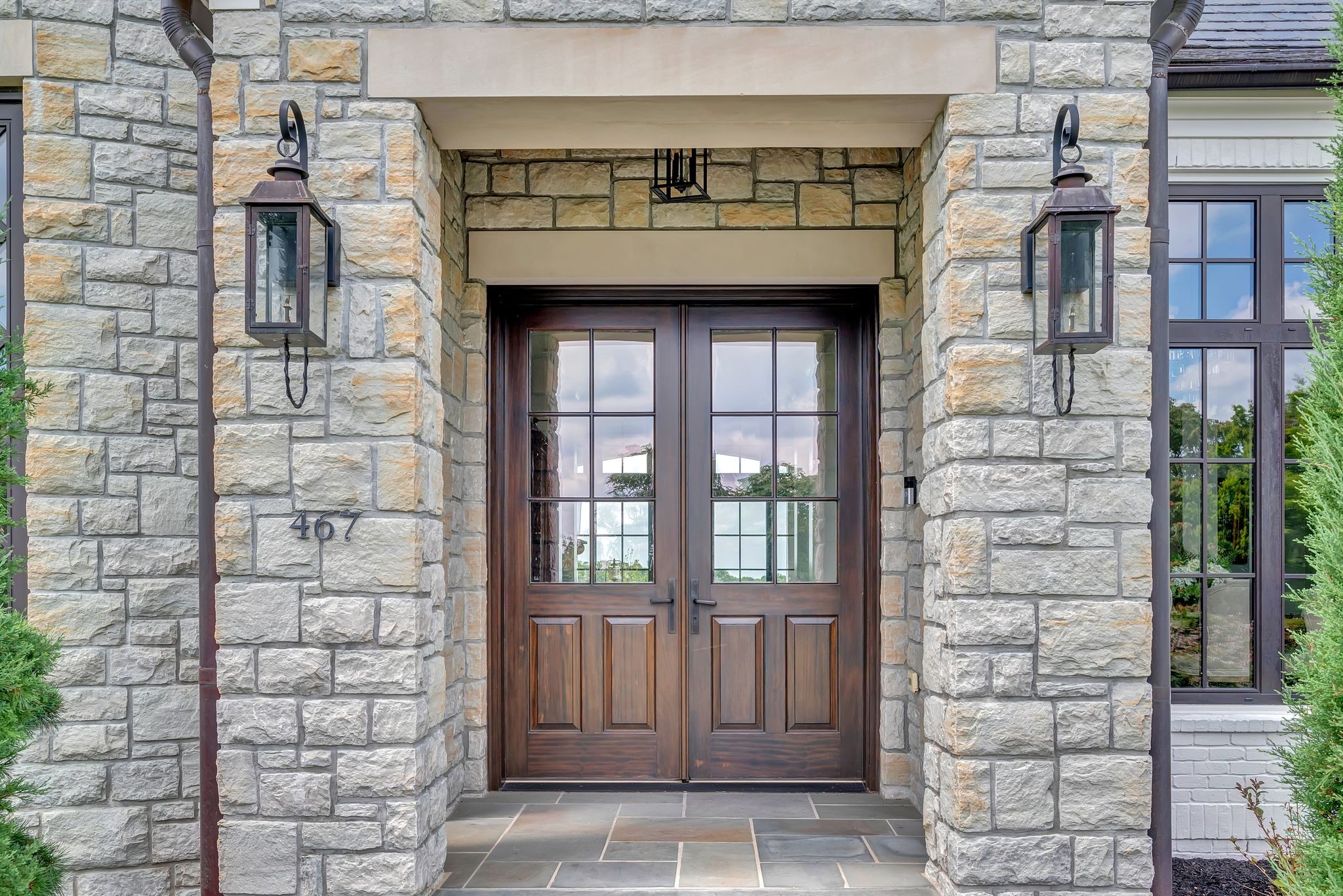 467 Canterbury Rise Franklin, TN 37067 - Photo 7 of 100 a front view of a house with a door