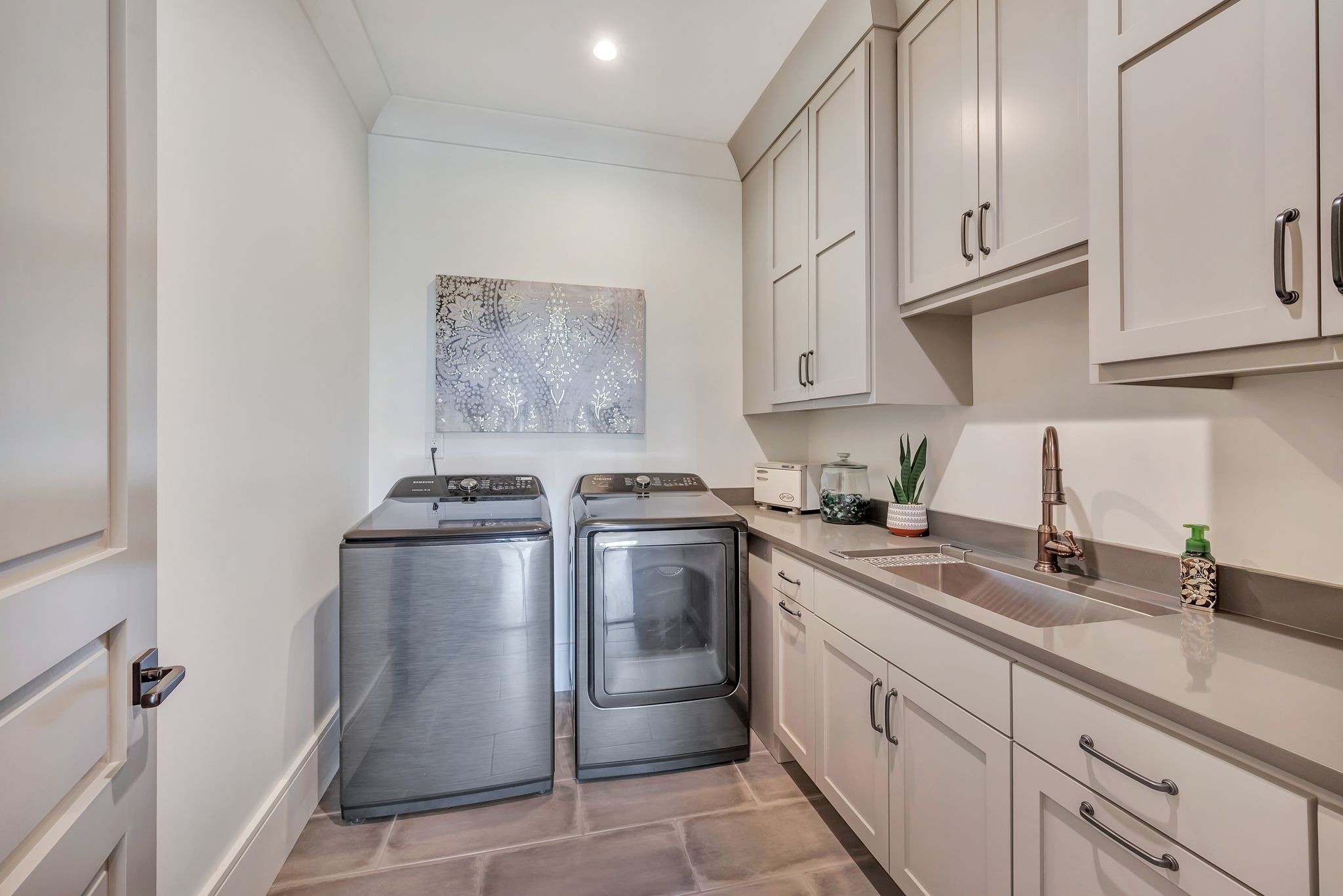 467 Canterbury Rise Franklin, TN 37067 - Photo 77 of 100 a kitchen with stainless steel appliances granite countertop a sink stove and cabinets