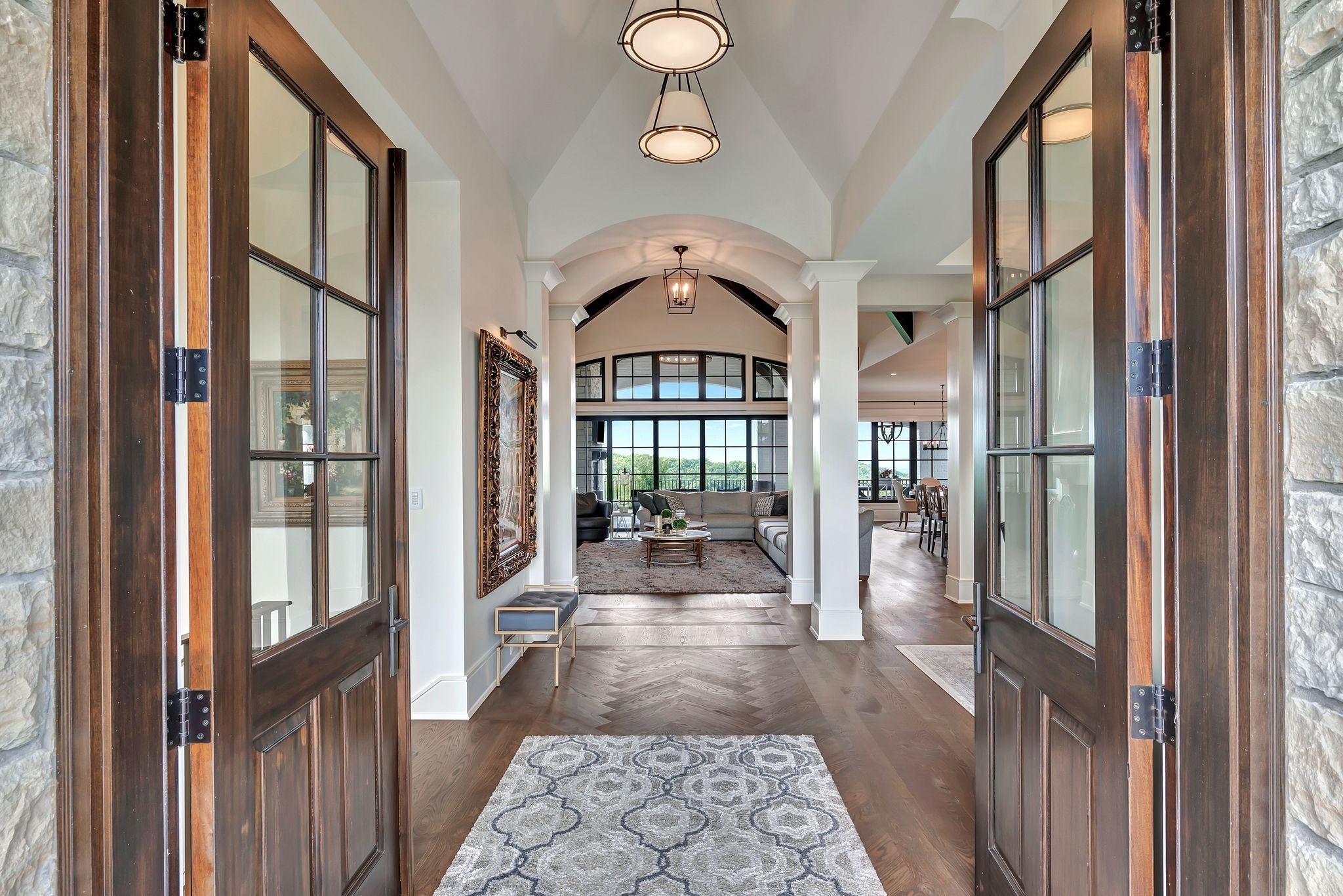 467 Canterbury Rise Franklin, TN 37067 - Photo 8 of 100 a view of a hallway with wooden floor and a dining room