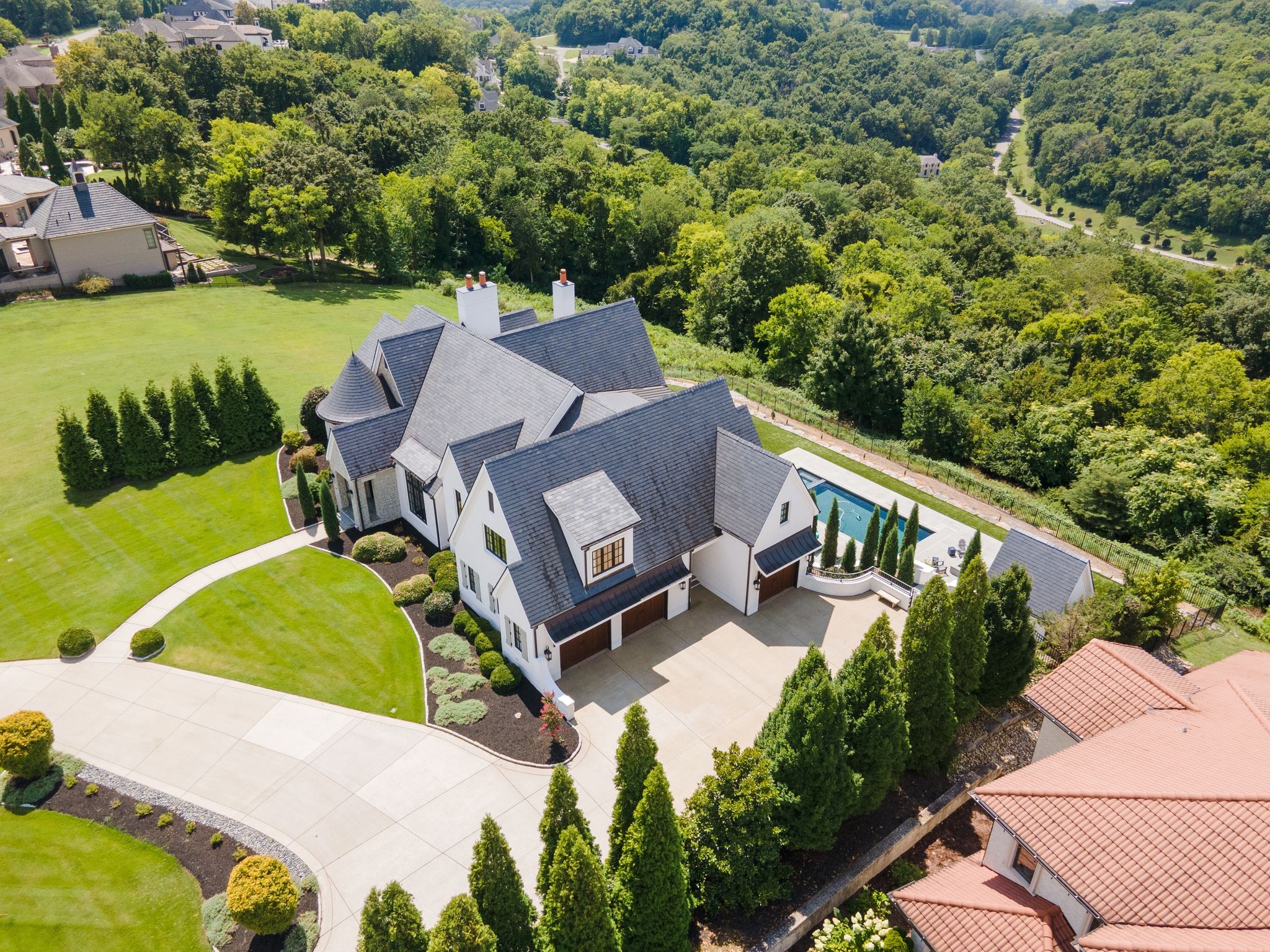 467 Canterbury Rise Franklin, TN 37067 - Photo 91 of 100 an aerial view of a house with garden space and outdoor seating