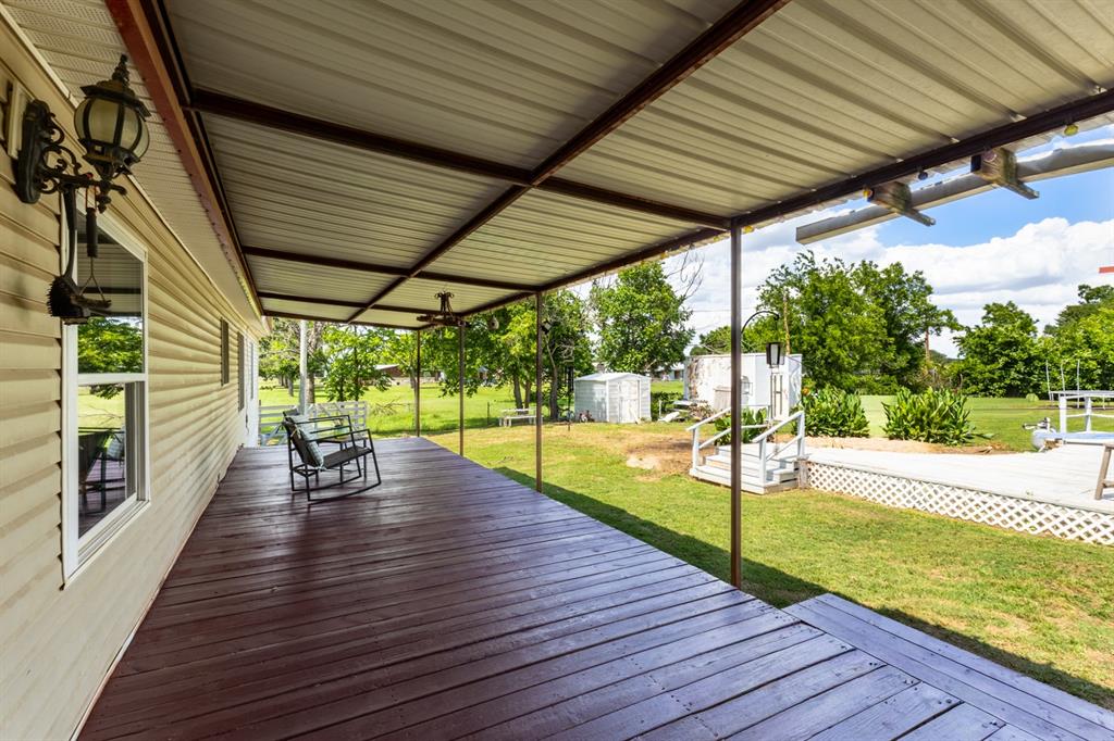 75 Southern Road Mineral Wells, TX 76067 - Photo 27 of 31 a view of a patio with swimming pool