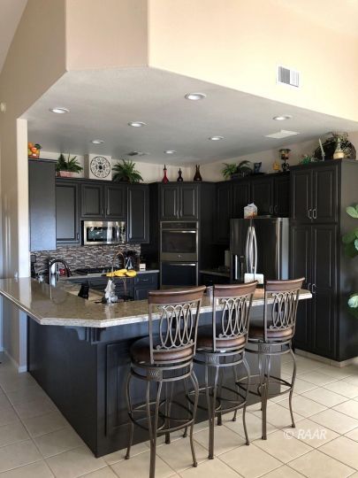 2872 South Summit Street Ridgecrest, CA 93555 - Photo 2 of 6 a view of a chairs and tables in the patio